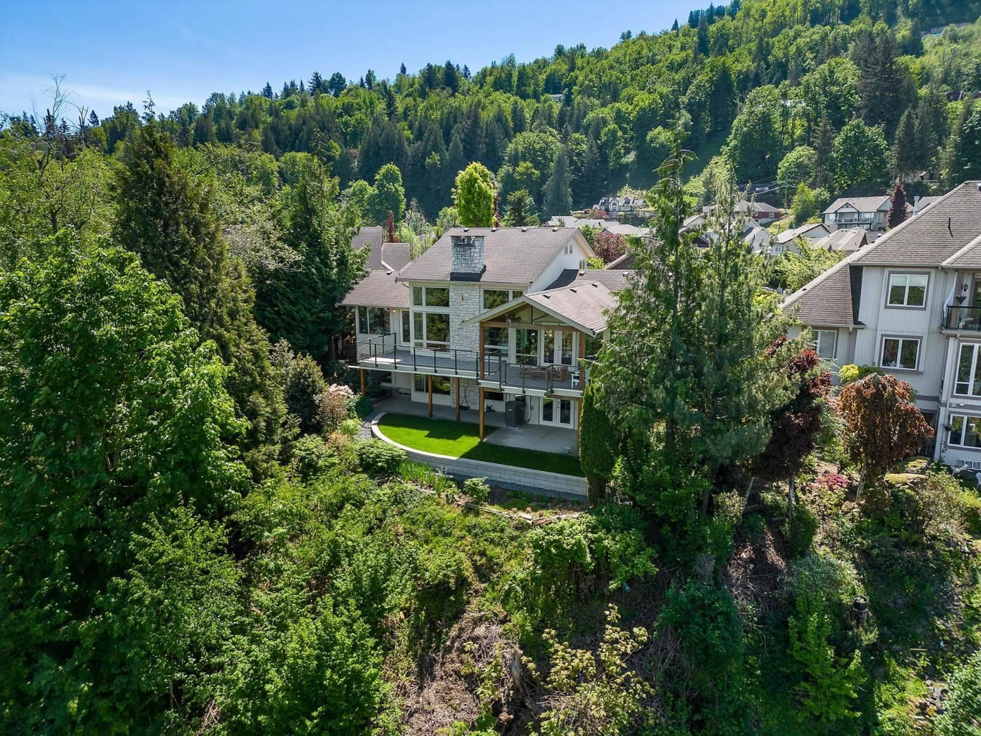 A pic from outside/outdoor area/front of a property/back of a property/a pic from drone, forest/trees view for 43857 STONERIDGE PLACE, Chilliwack British Columbia V2R5V2