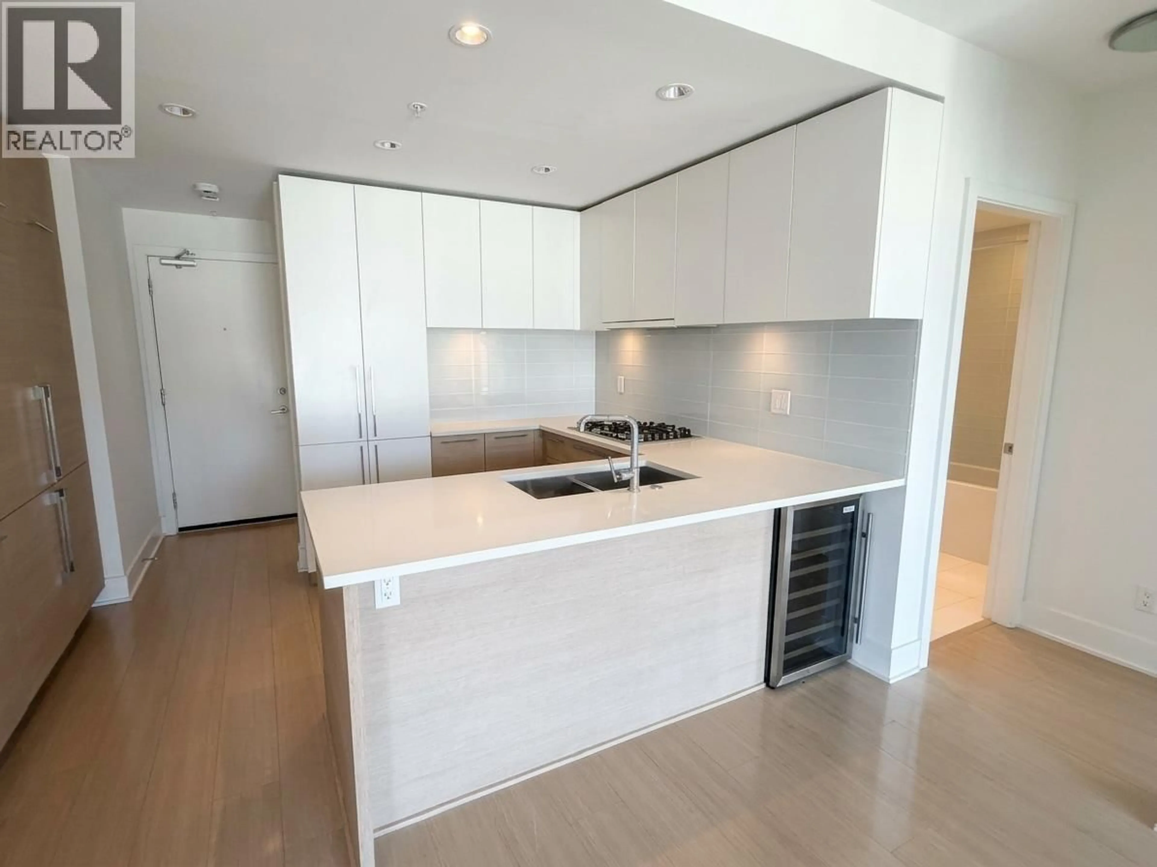 Open concept kitchen, unknown for 3505 - 1188 PINETREE WAY, Coquitlam British Columbia V3B0K9