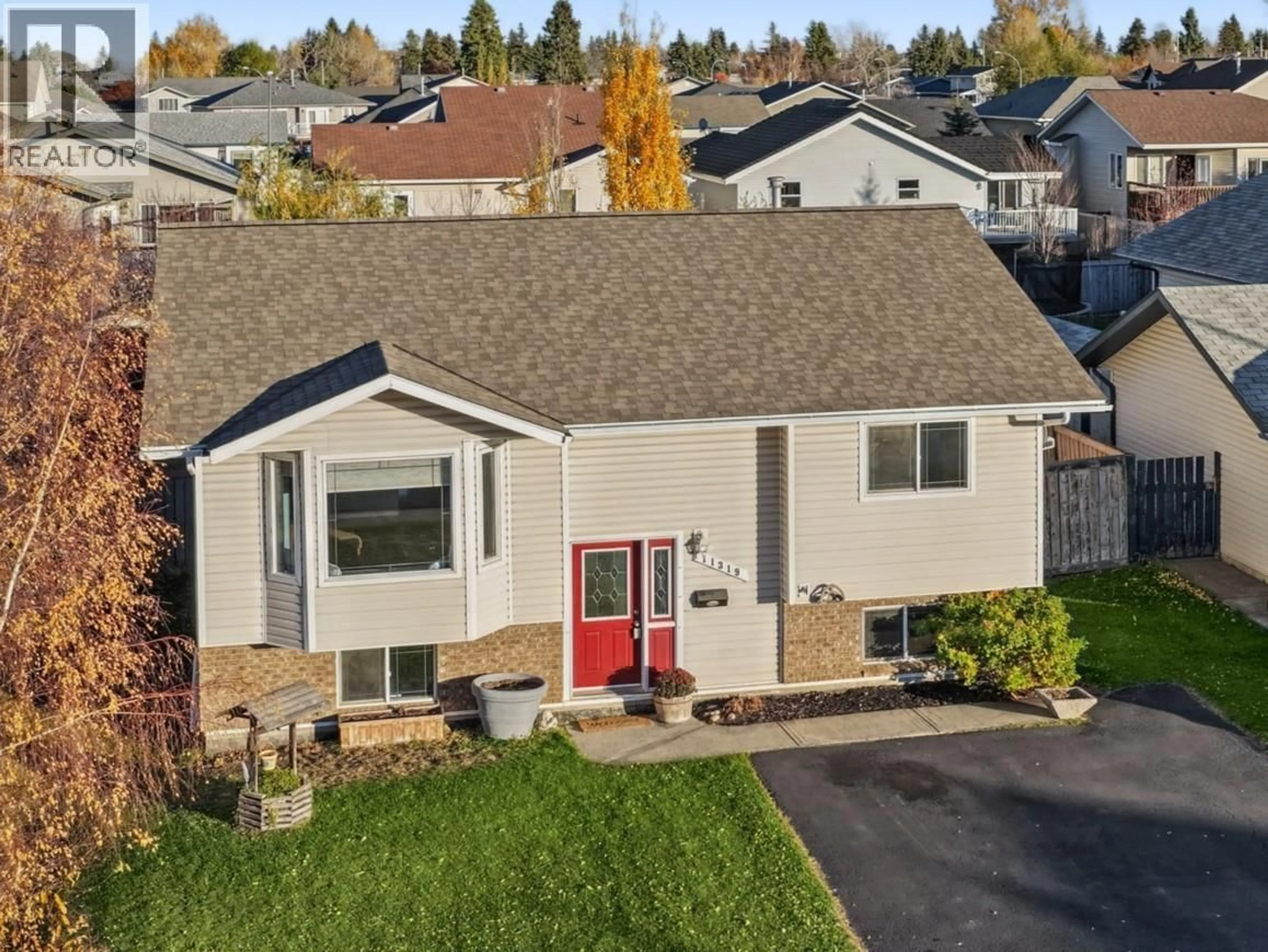 A pic from outside/outdoor area/front of a property/back of a property/a pic from drone, street for 11319 98 STREET, Fort St. John British Columbia V1J7B5