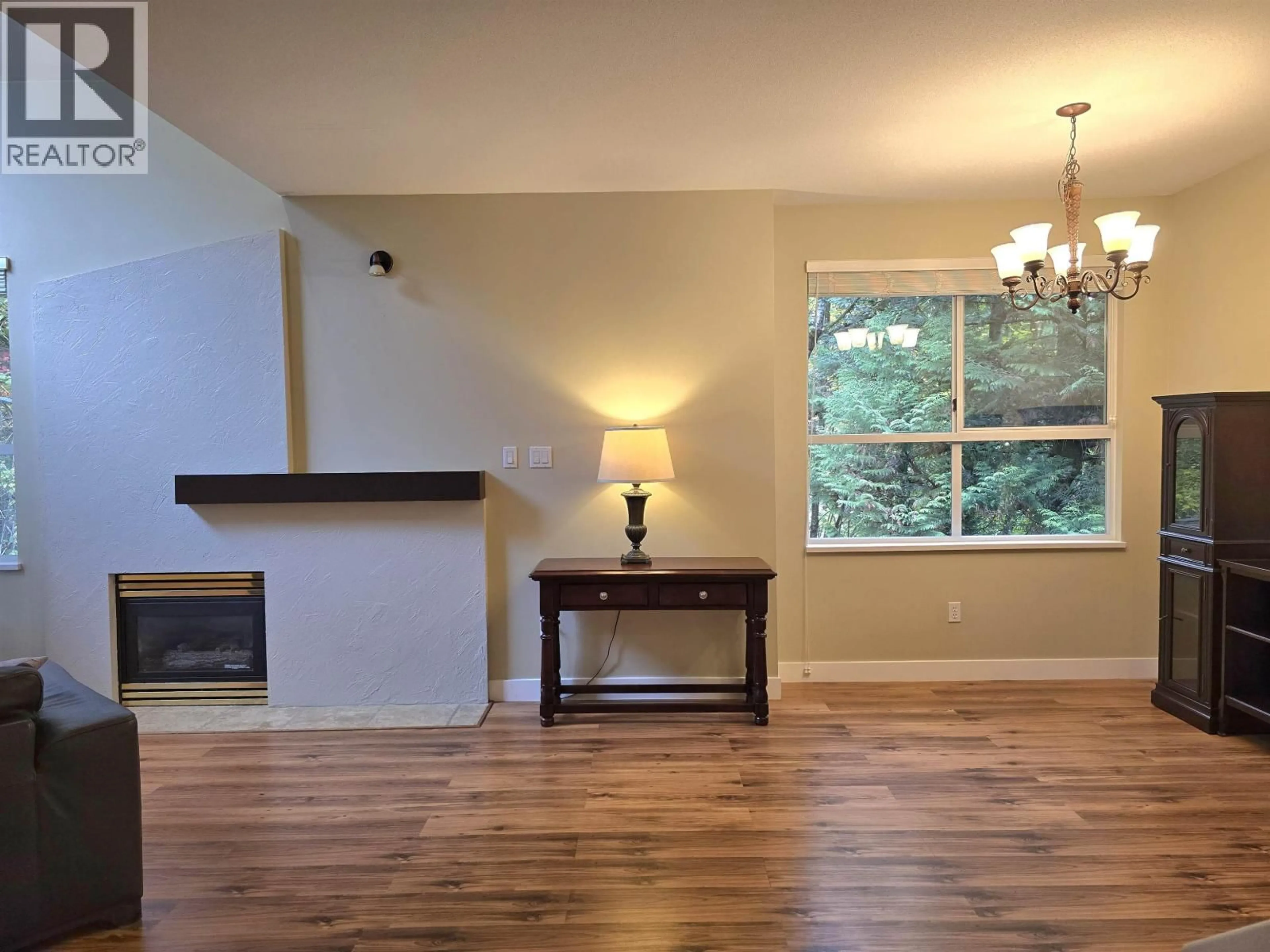 Living room with furniture, wood/laminate floor for 224 - 1465 PARKWAY BOULEVARD, Coquitlam British Columbia V3E3E6