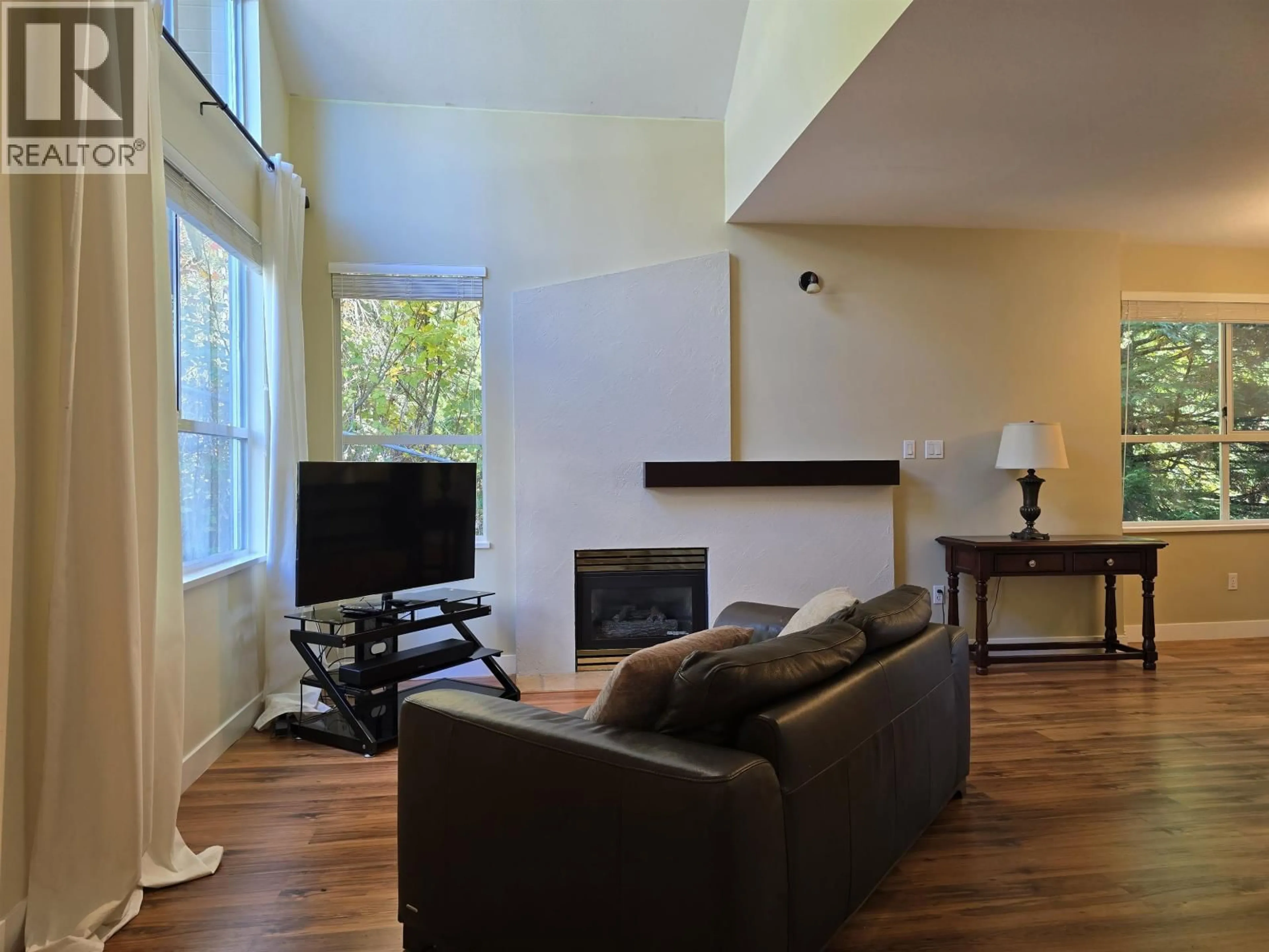 Living room with furniture, wood/laminate floor for 224 - 1465 PARKWAY BOULEVARD, Coquitlam British Columbia V3E3E6