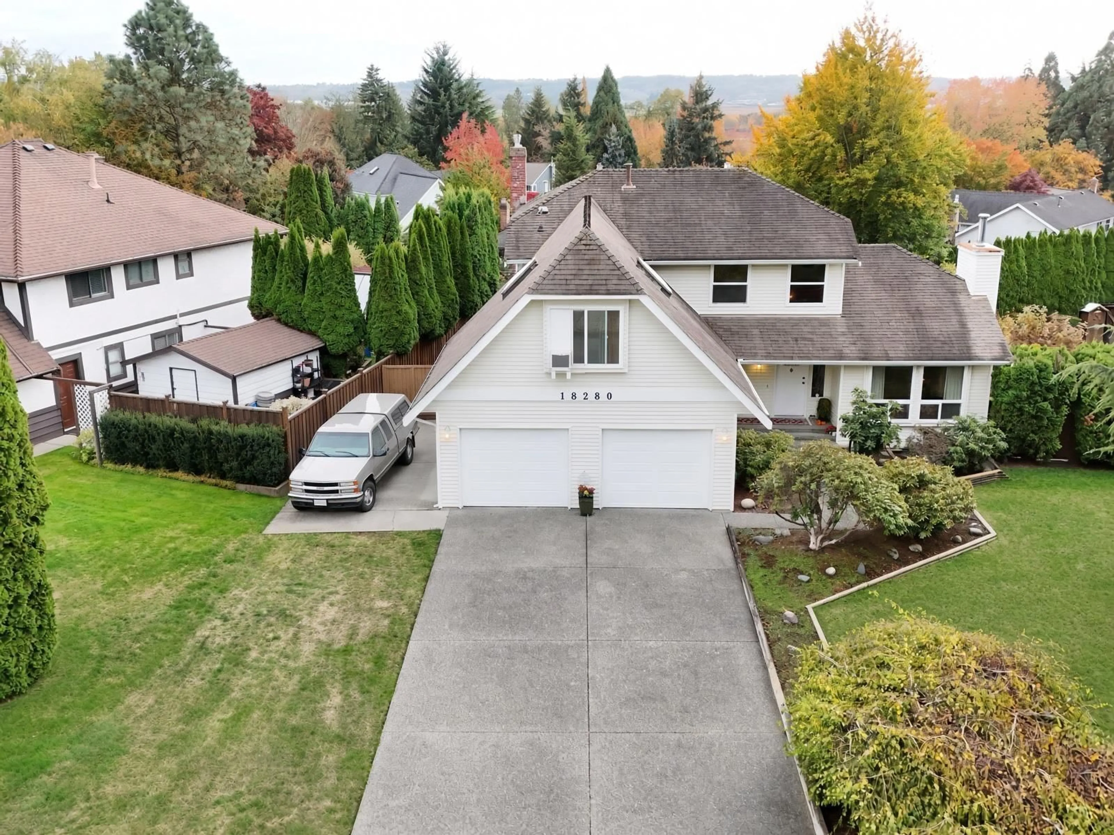 A pic from outside/outdoor area/front of a property/back of a property/a pic from drone, unknown for 18280 55B AVENUE, Surrey British Columbia V3S7Z2