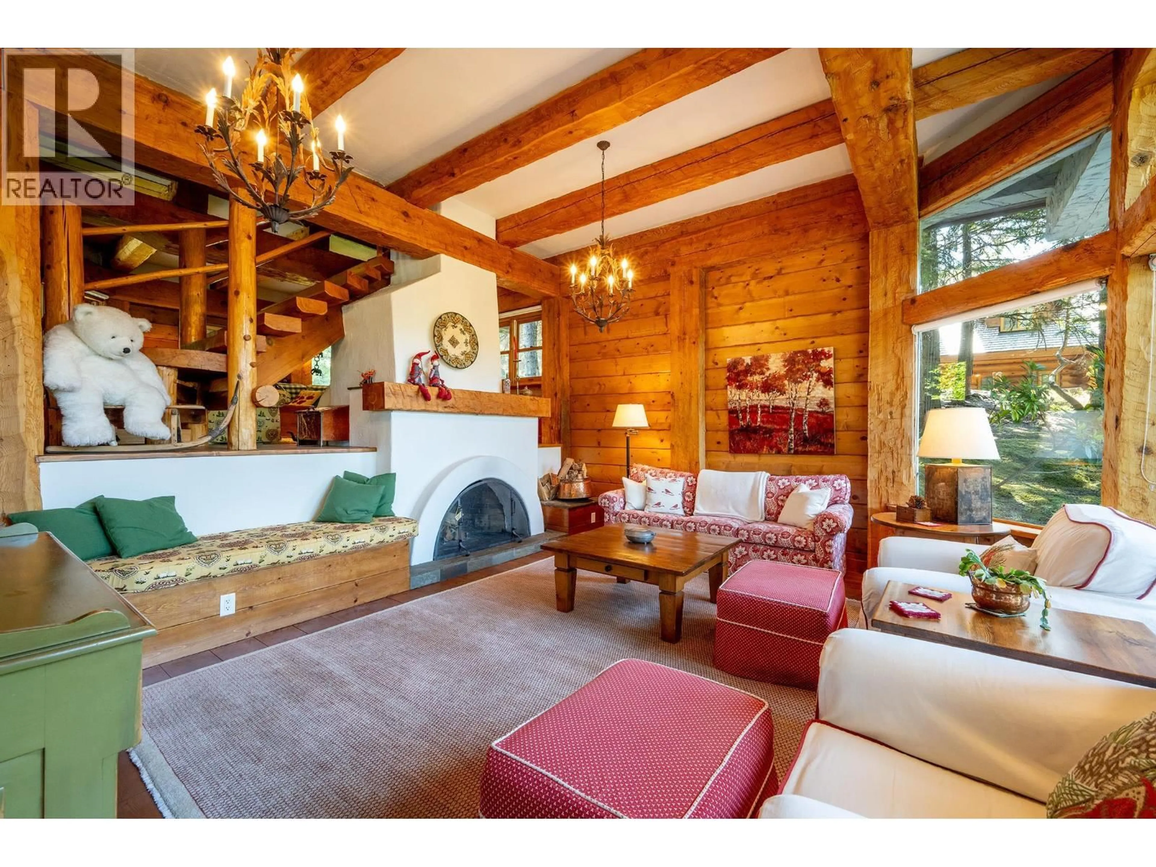 Living room with furniture, wood/laminate floor for 6416 LINKSIDE ROAD, Whistler British Columbia V8E0C9