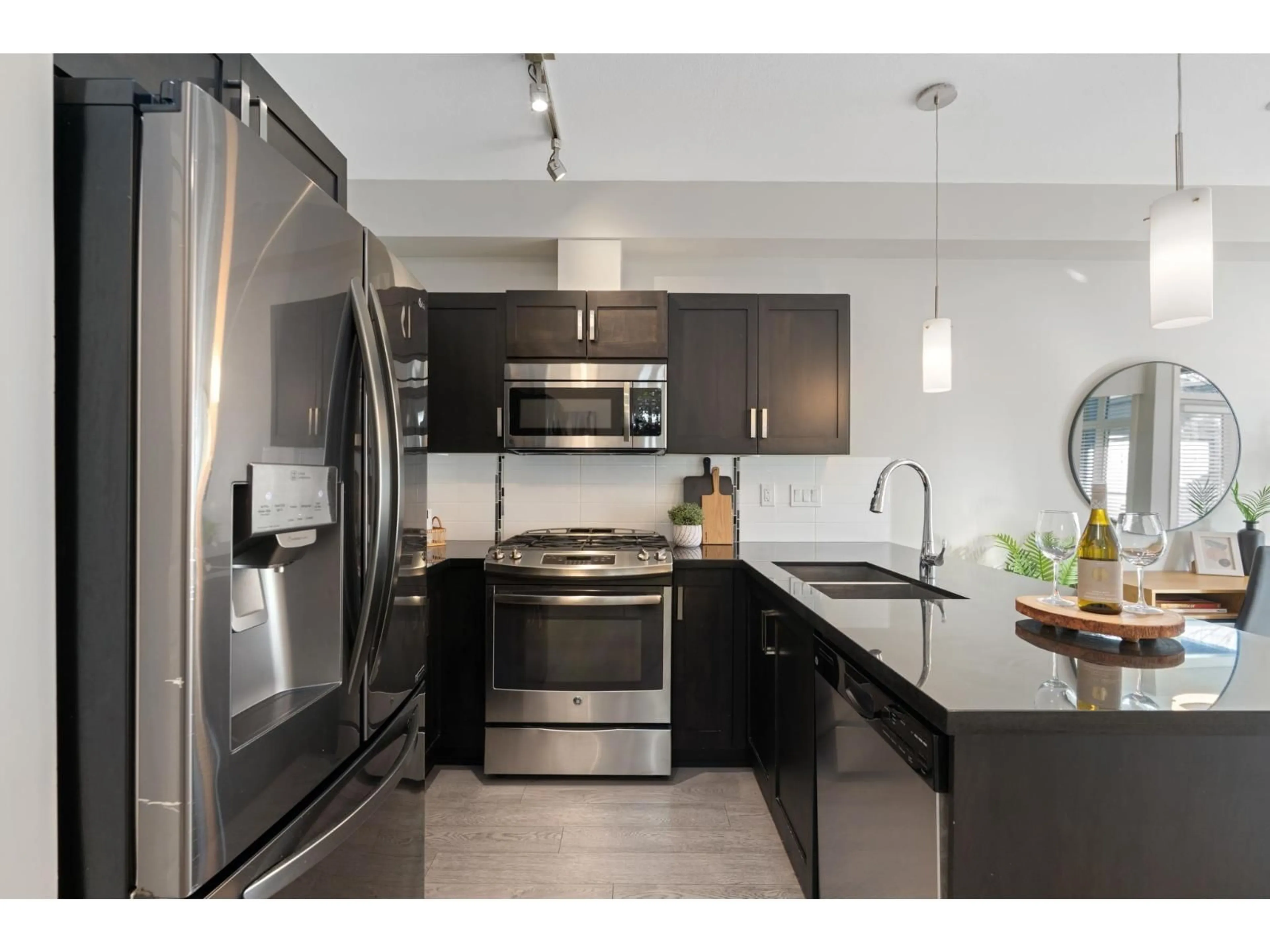 Open concept kitchen, unknown for 105 - 20078 FRASER HIGHWAY, Langley British Columbia V3A0J2