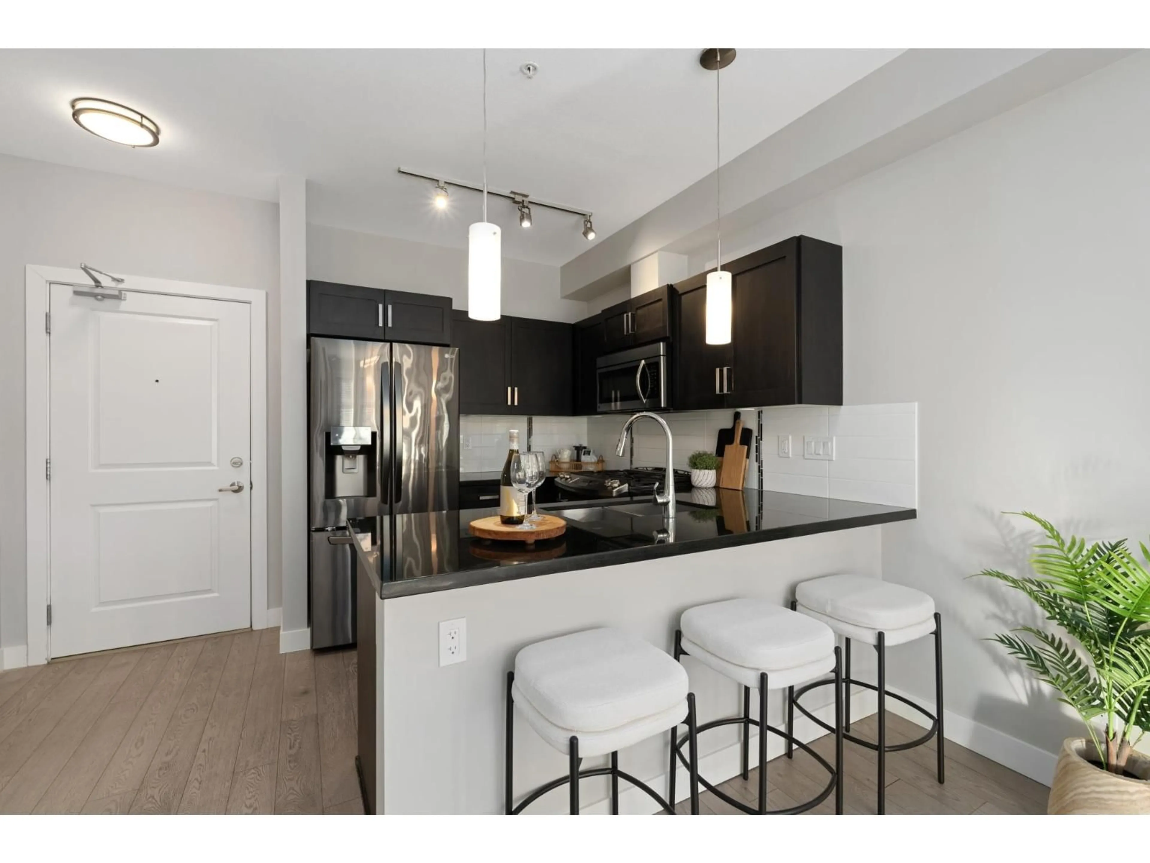 Open concept kitchen, unknown for 105 - 20078 FRASER HIGHWAY, Langley British Columbia V3A0J2
