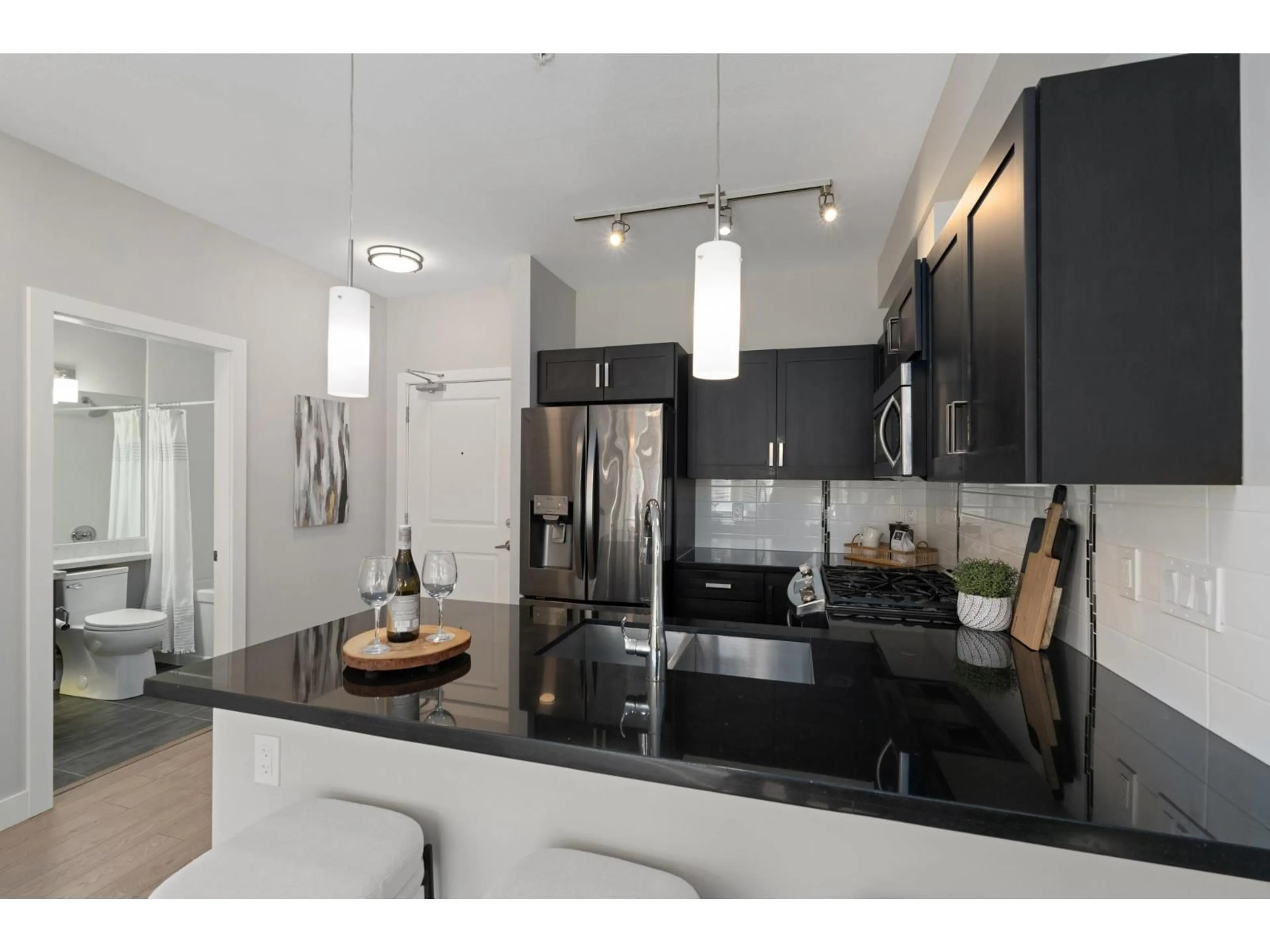 Open concept kitchen, unknown for 105 - 20078 FRASER HIGHWAY, Langley British Columbia V3A0J2