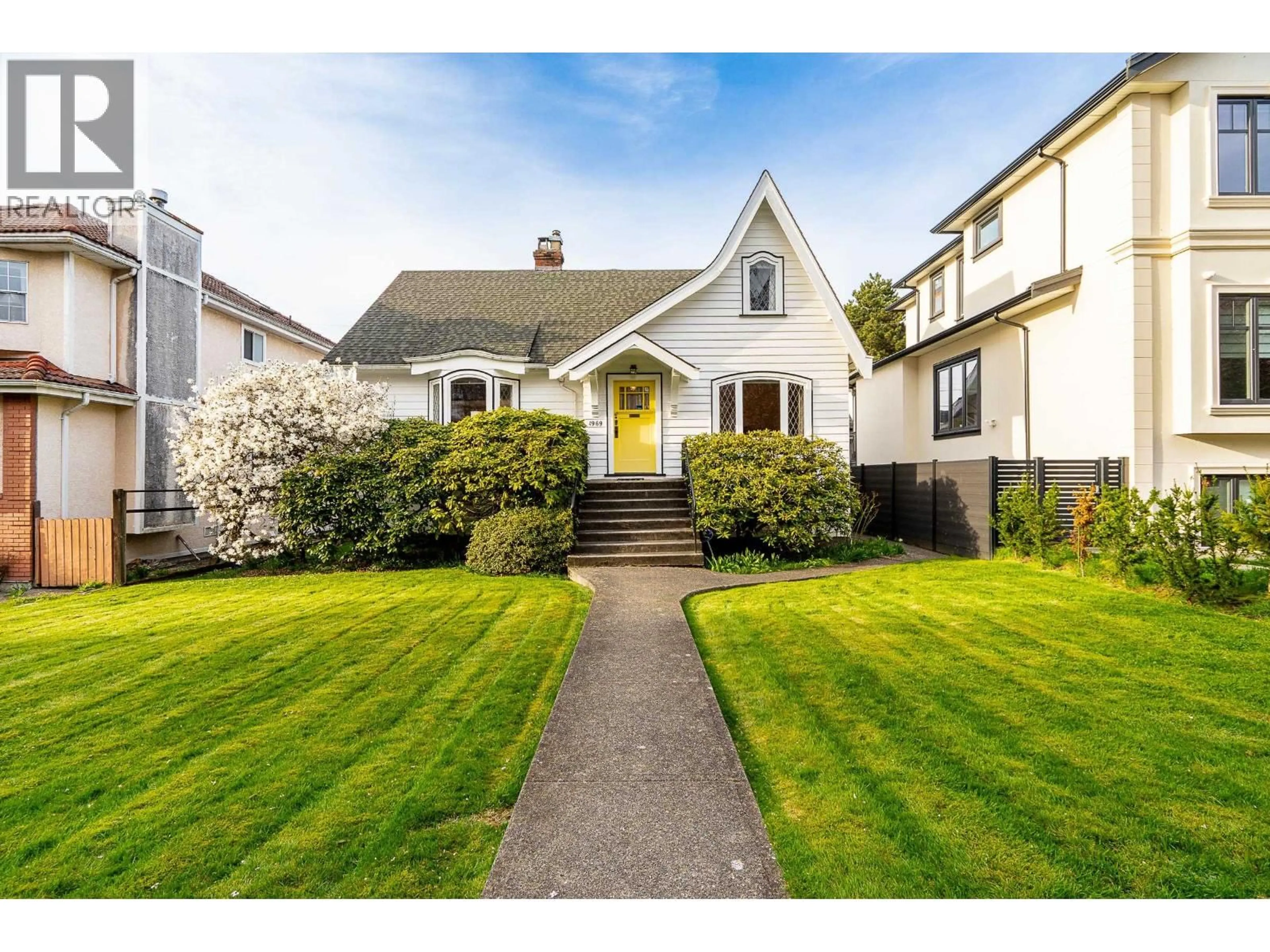 Home with vinyl exterior material, street for 1969 43RD AVENUE, Vancouver British Columbia V6M2C7