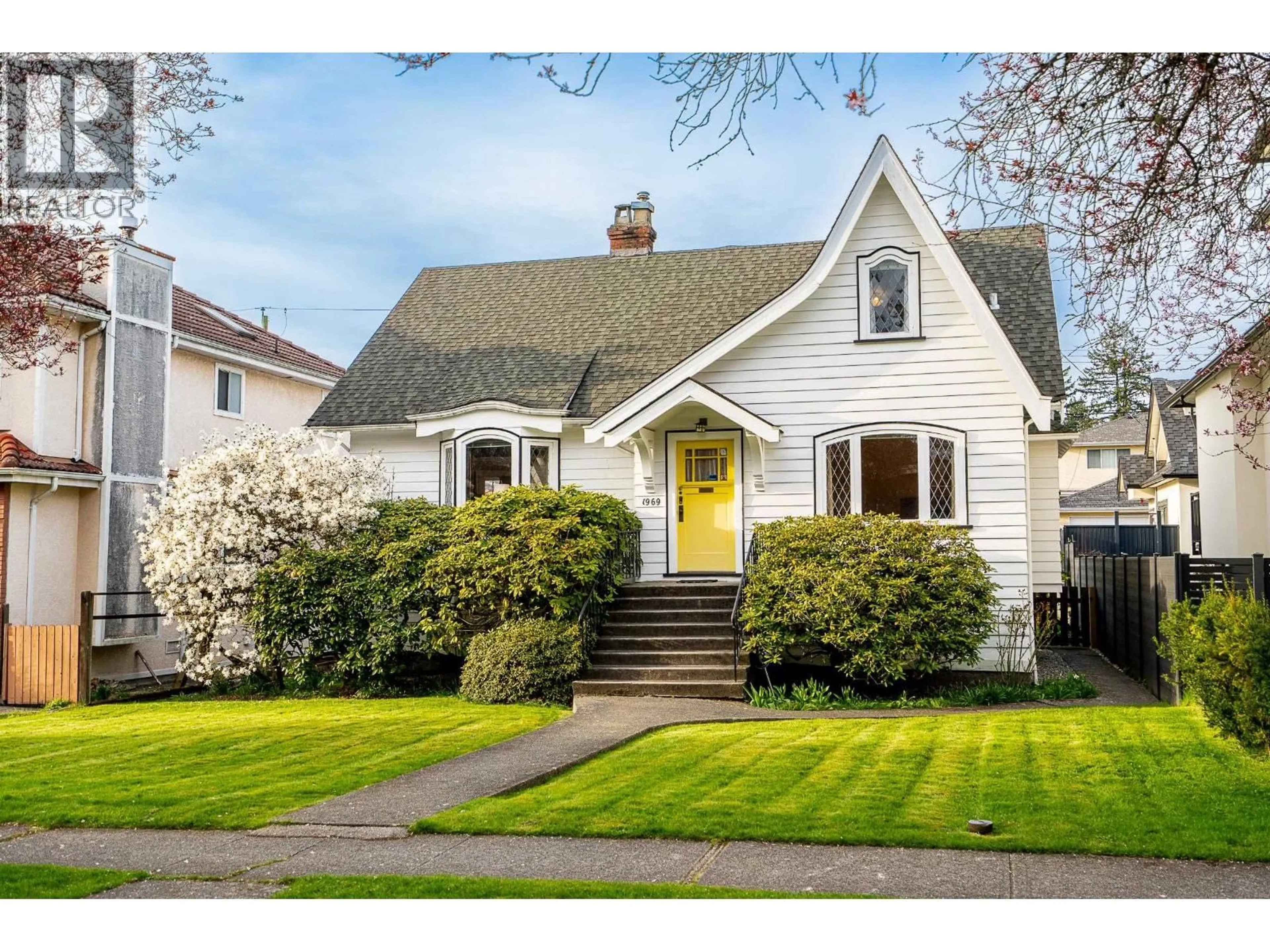 Home with vinyl exterior material, street for 1969 43RD AVENUE, Vancouver British Columbia V6M2C7
