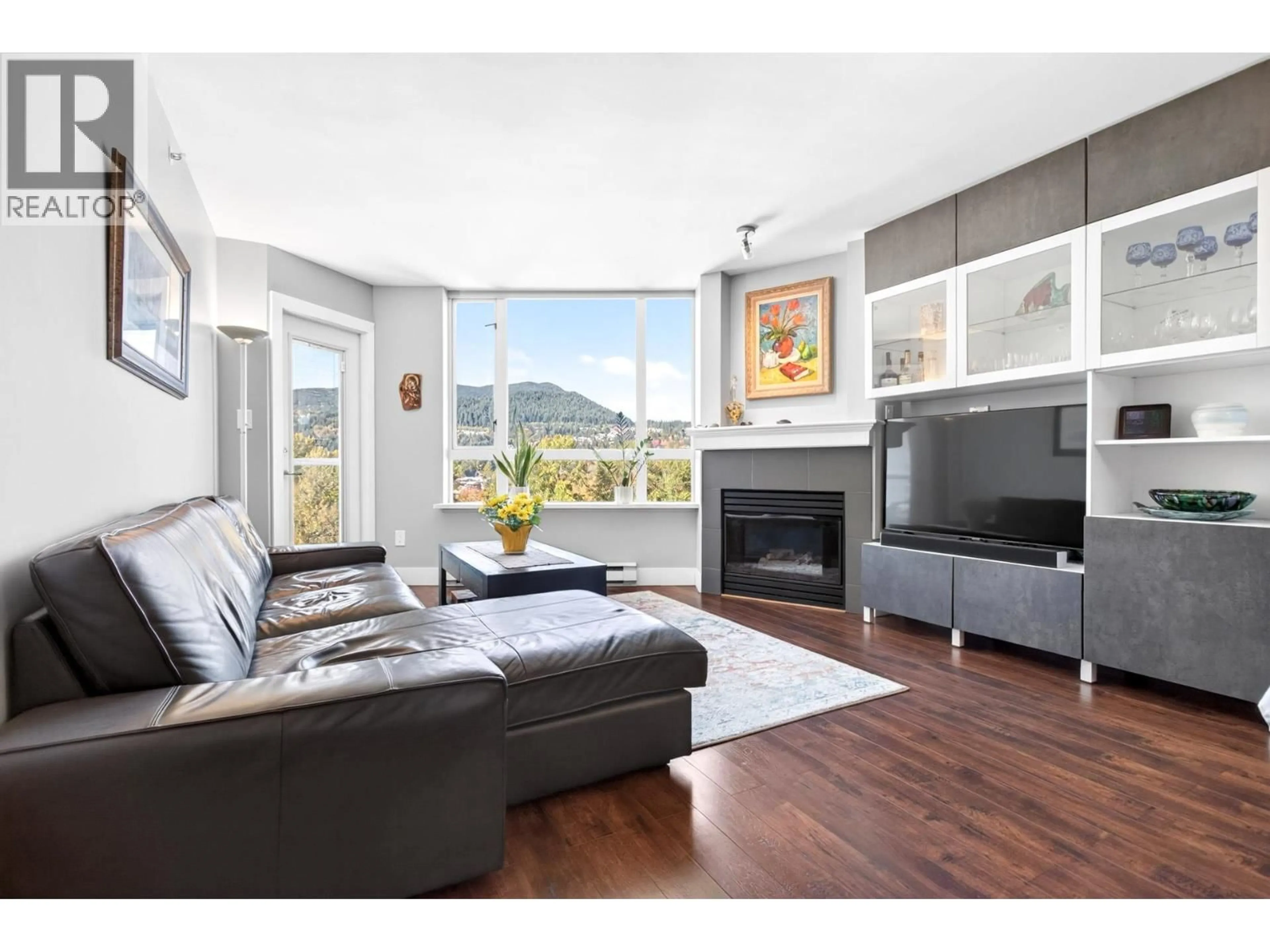 Living room with furniture, wood/laminate floor for 1401 - 1199 EASTWOOD STREET, Coquitlam British Columbia V3B7W7
