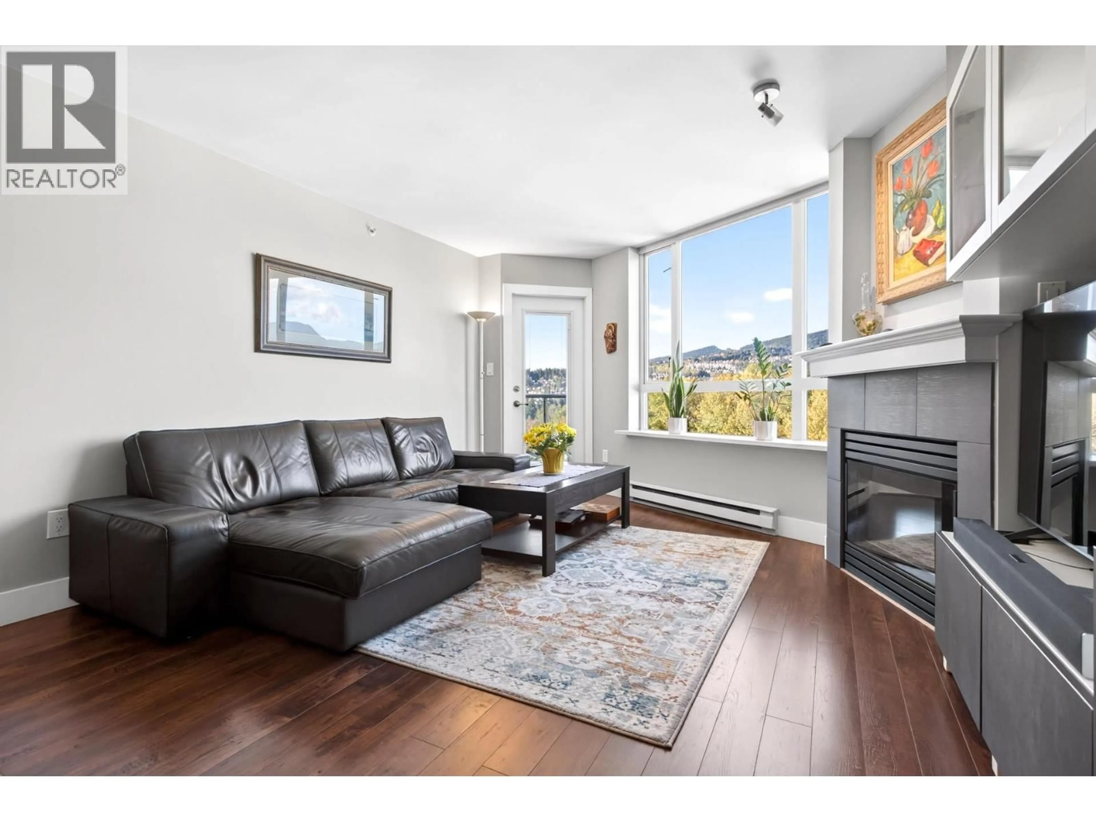 Living room with furniture, wood/laminate floor for 1401 - 1199 EASTWOOD STREET, Coquitlam British Columbia V3B7W7