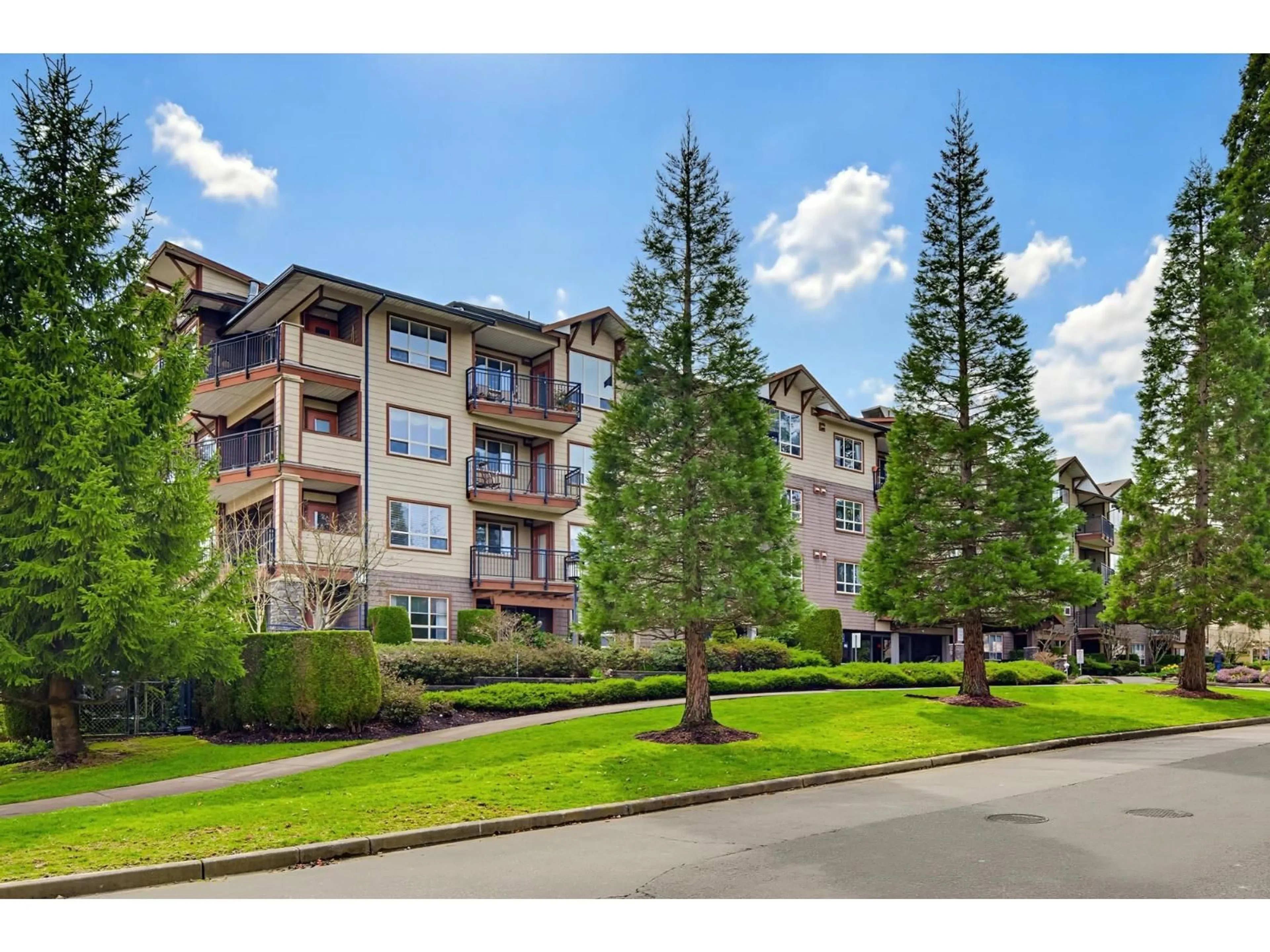 A pic from outside/outdoor area/front of a property/back of a property/a pic from drone, mountain view for 411 - 16068 83 AVENUE, Surrey British Columbia V4N0N2