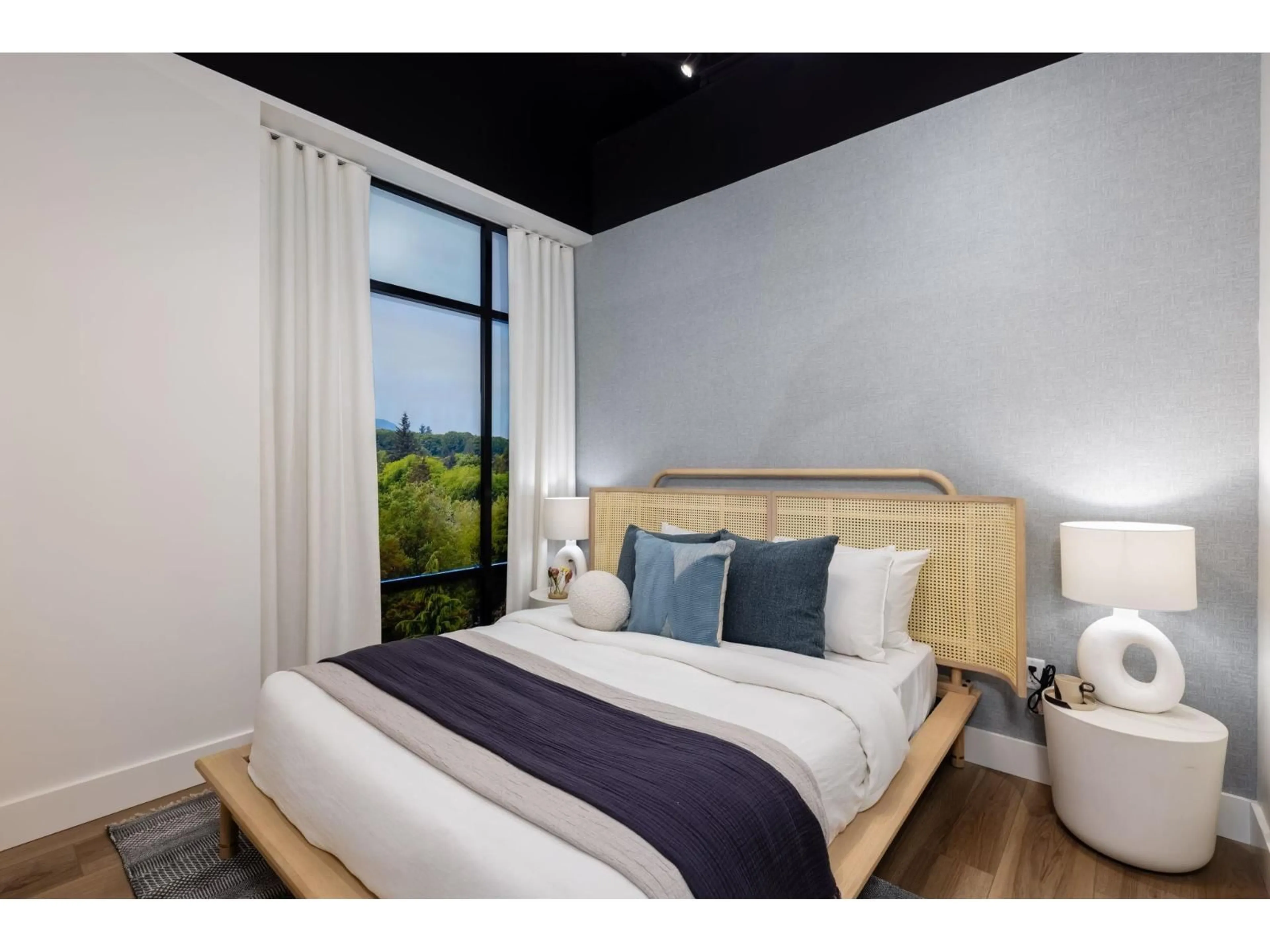 Bedroom with bed, wood/laminate floor for 213 - 30424 CARDINAL AVENUE, Abbotsford British Columbia N0N0N0