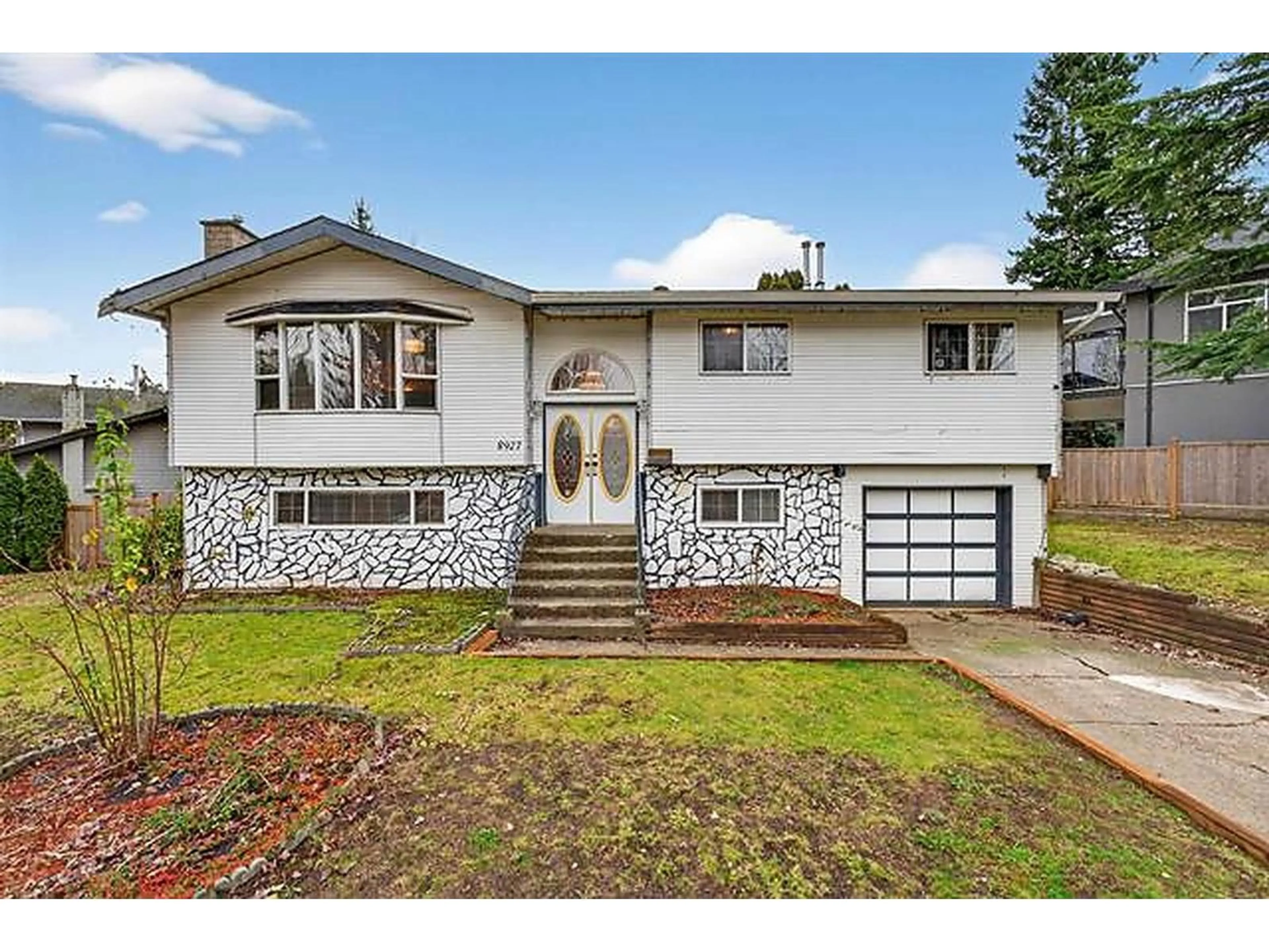 Home with vinyl exterior material, street for 8927 146A STREET, Surrey British Columbia V3R6Z9