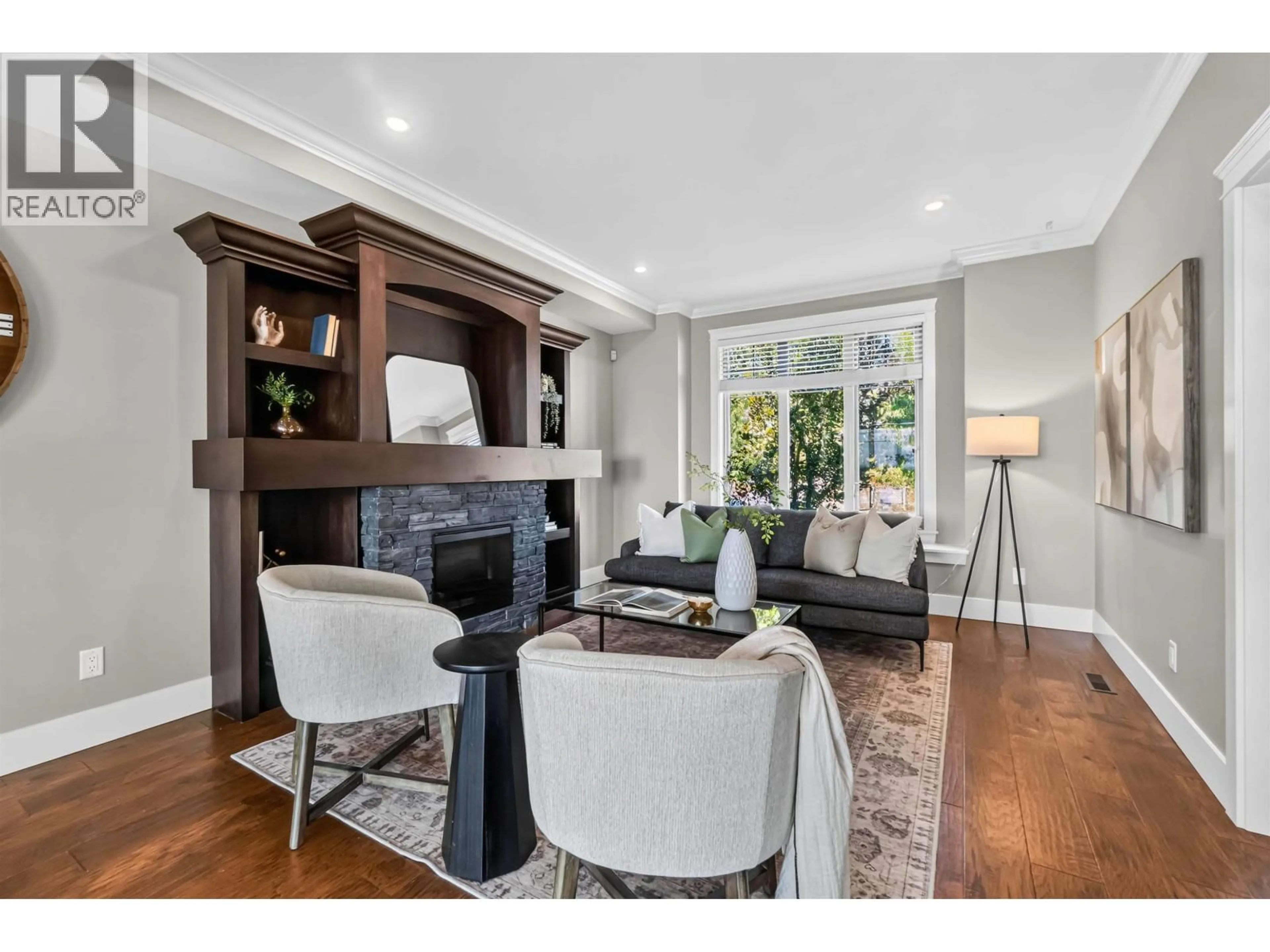 Living room with furniture, wood/laminate floor for 108 - 3416 ROXTON AVENUE, Coquitlam British Columbia V3B0G7