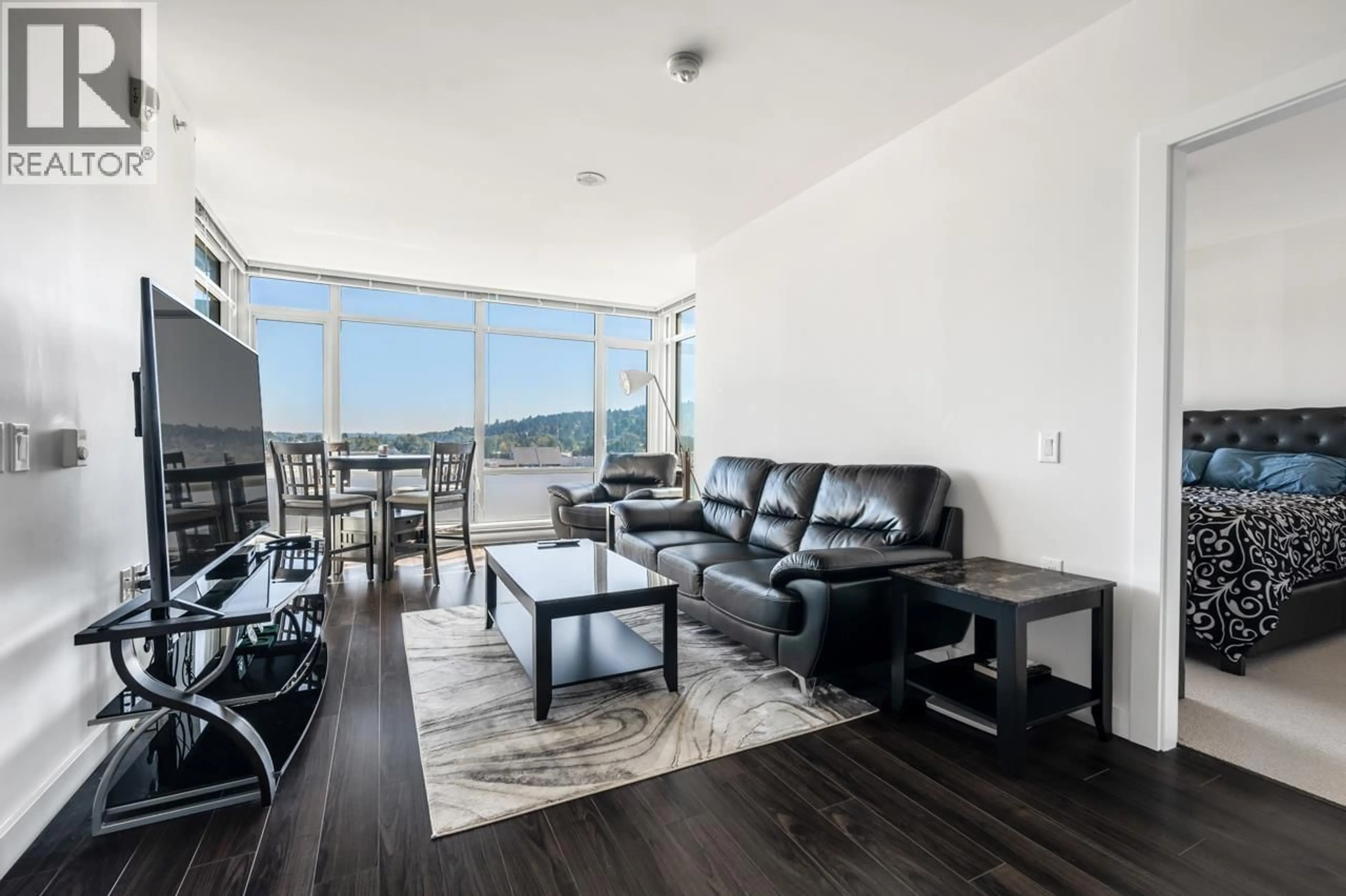 Living room with furniture, wood/laminate floor for 806 - 2955 ATLANTIC AVENUE, Port Coquitlam British Columbia V3B0H9