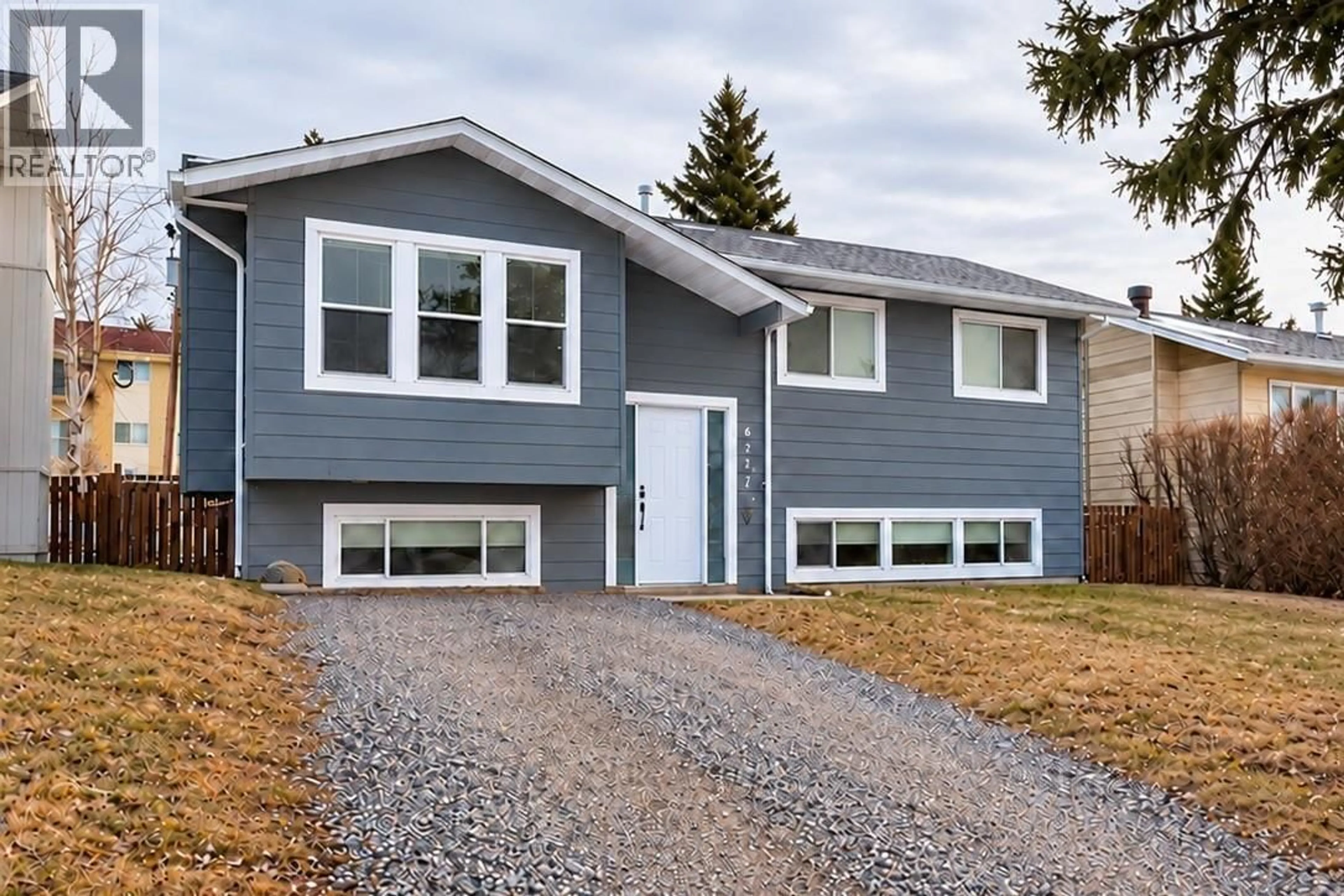 Home with vinyl exterior material, street for 8923 87 STREET, Fort St. John British Columbia V1J5H3