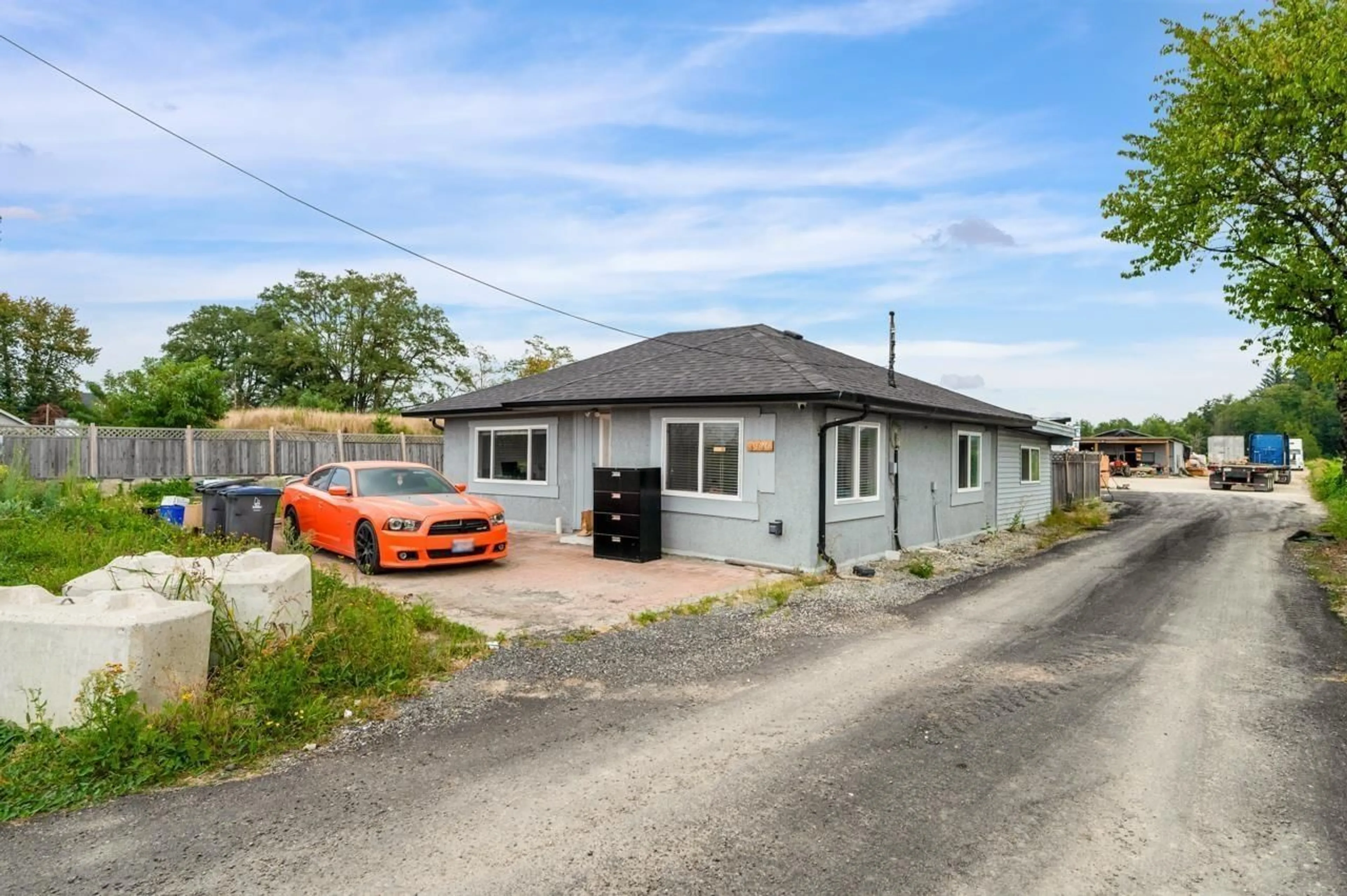 A pic from outside/outdoor area/front of a property/back of a property/a pic from drone, street for 3936 176 STREET, Surrey British Columbia V3Z1C4