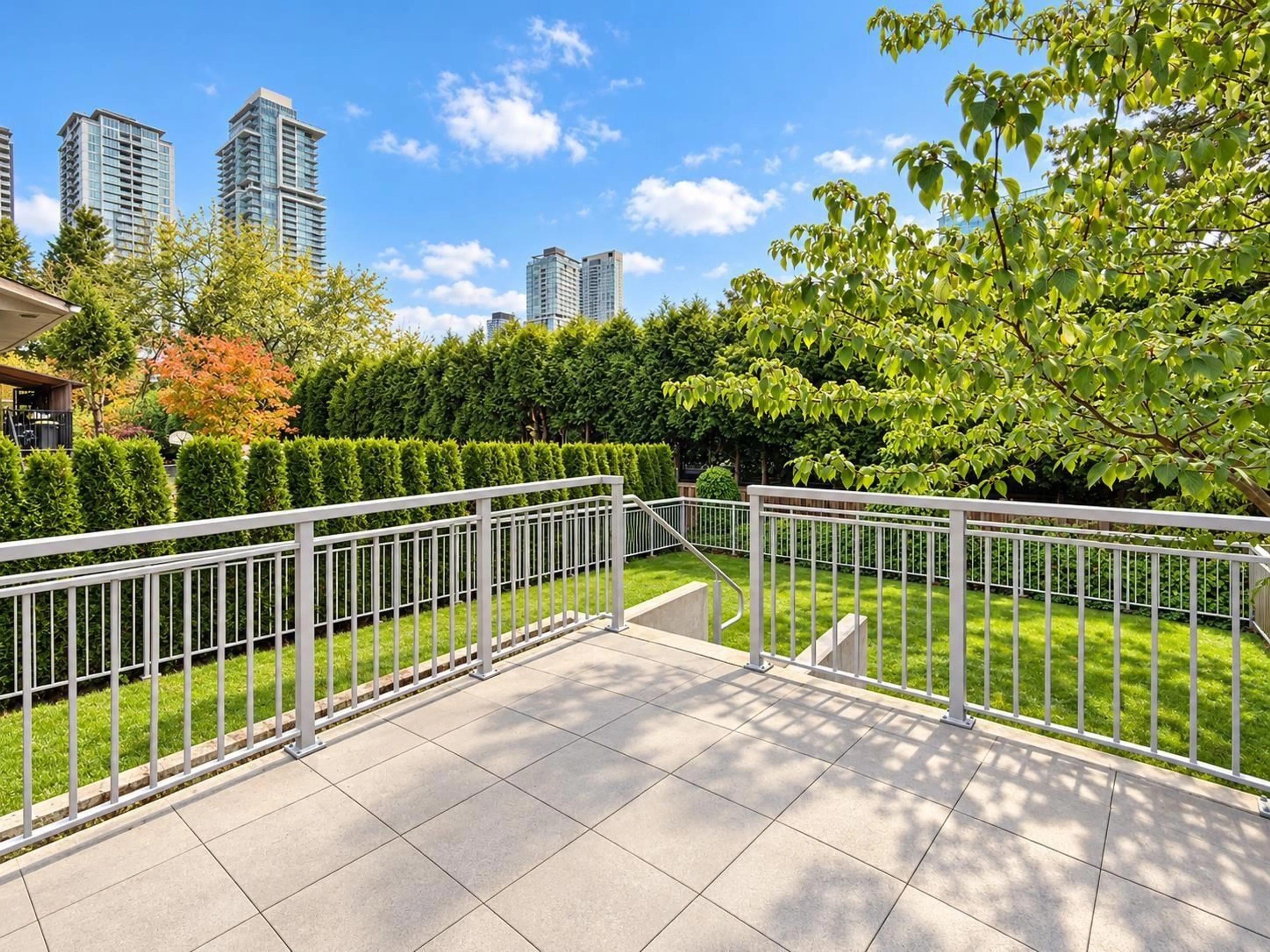 Patio, city buildings view from balcony for 9 - 10180 133 STREET, Surrey British Columbia V3T0S4