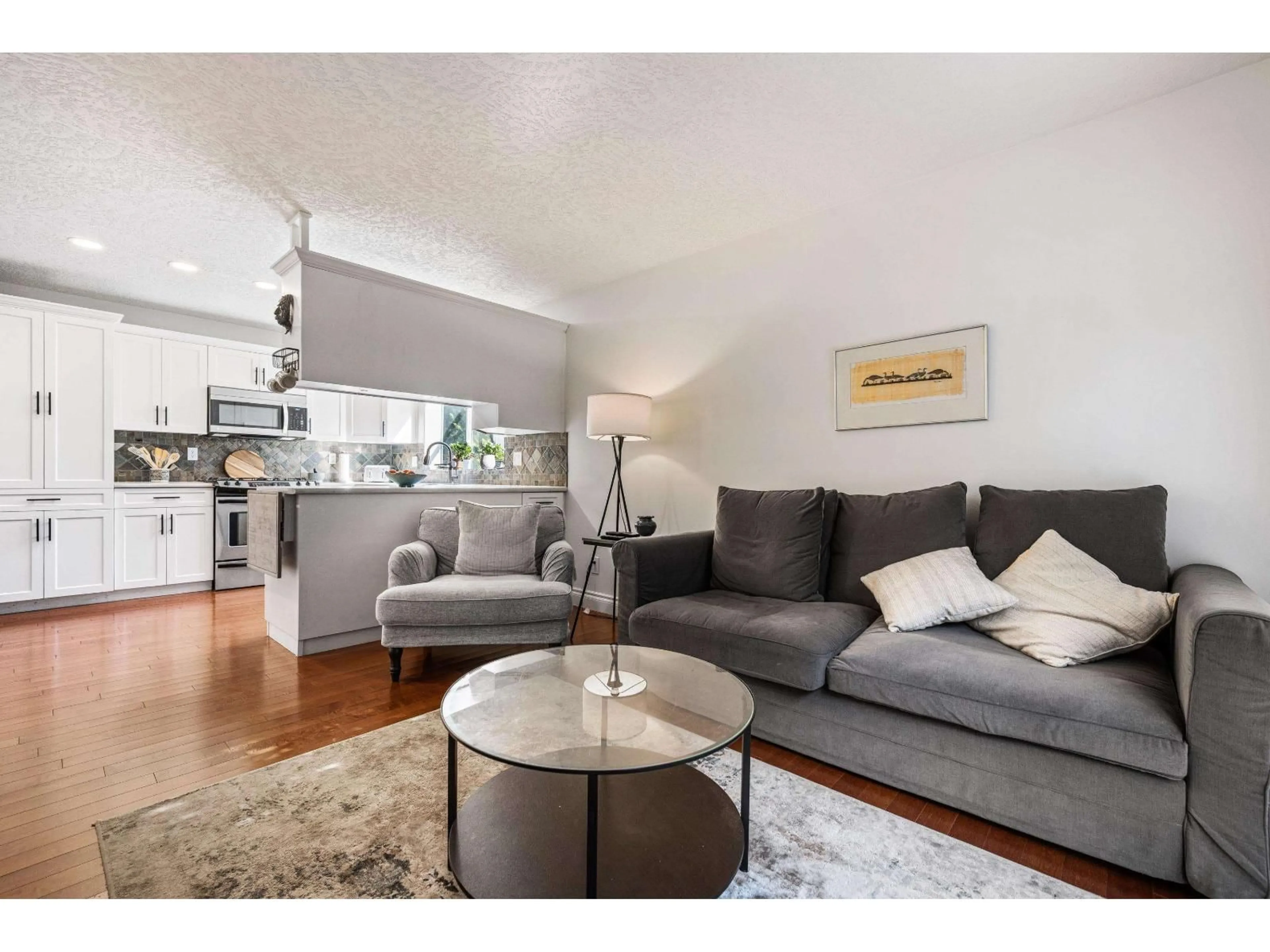 Living room with furniture, wood/laminate floor for 120 - 4001 OLD CLAYBURN ROAD, Abbotsford British Columbia V3G1C5