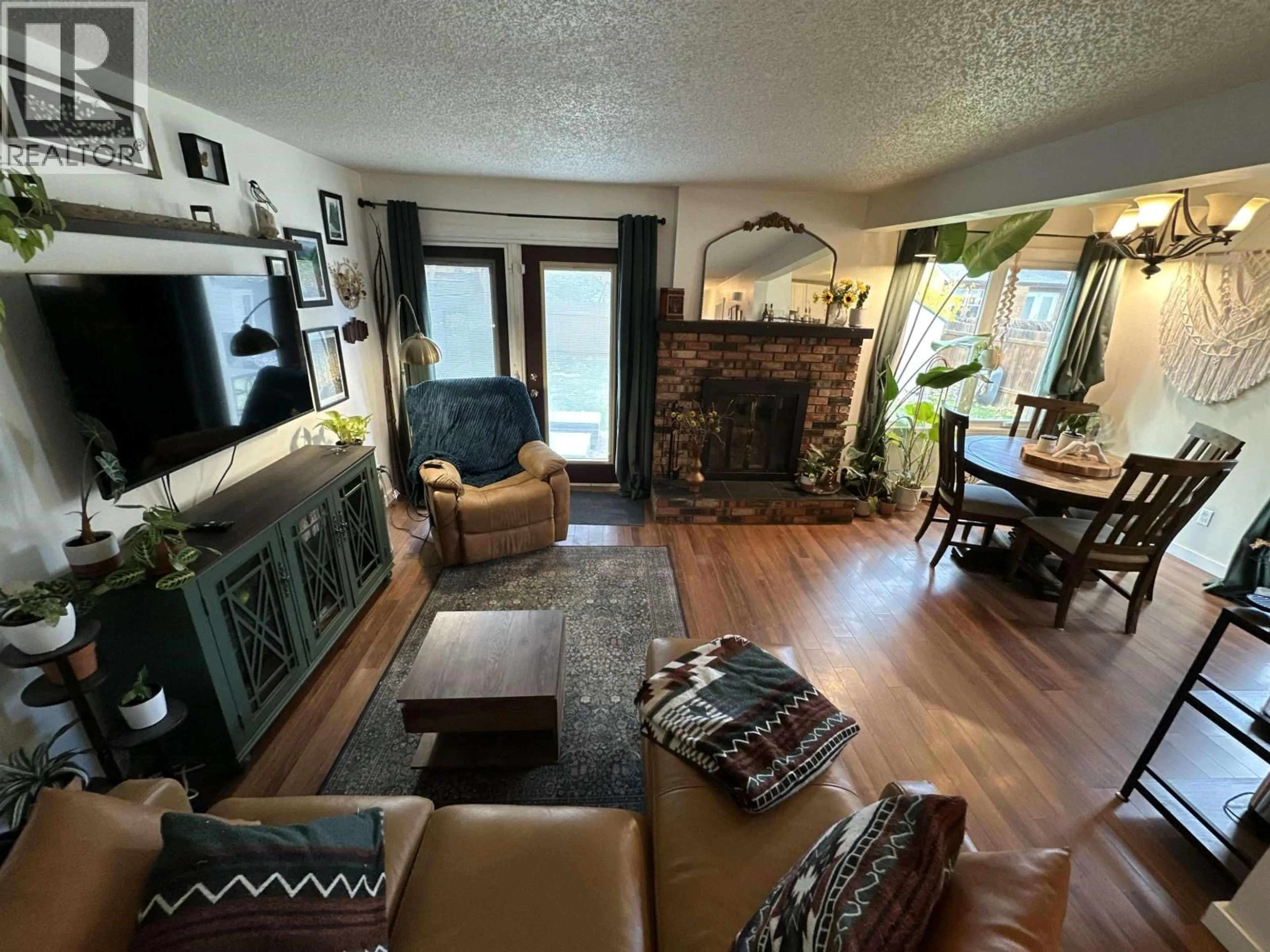 Living room with furniture, unknown for 10406 88A STREET, Fort St. John British Columbia V1J5X7