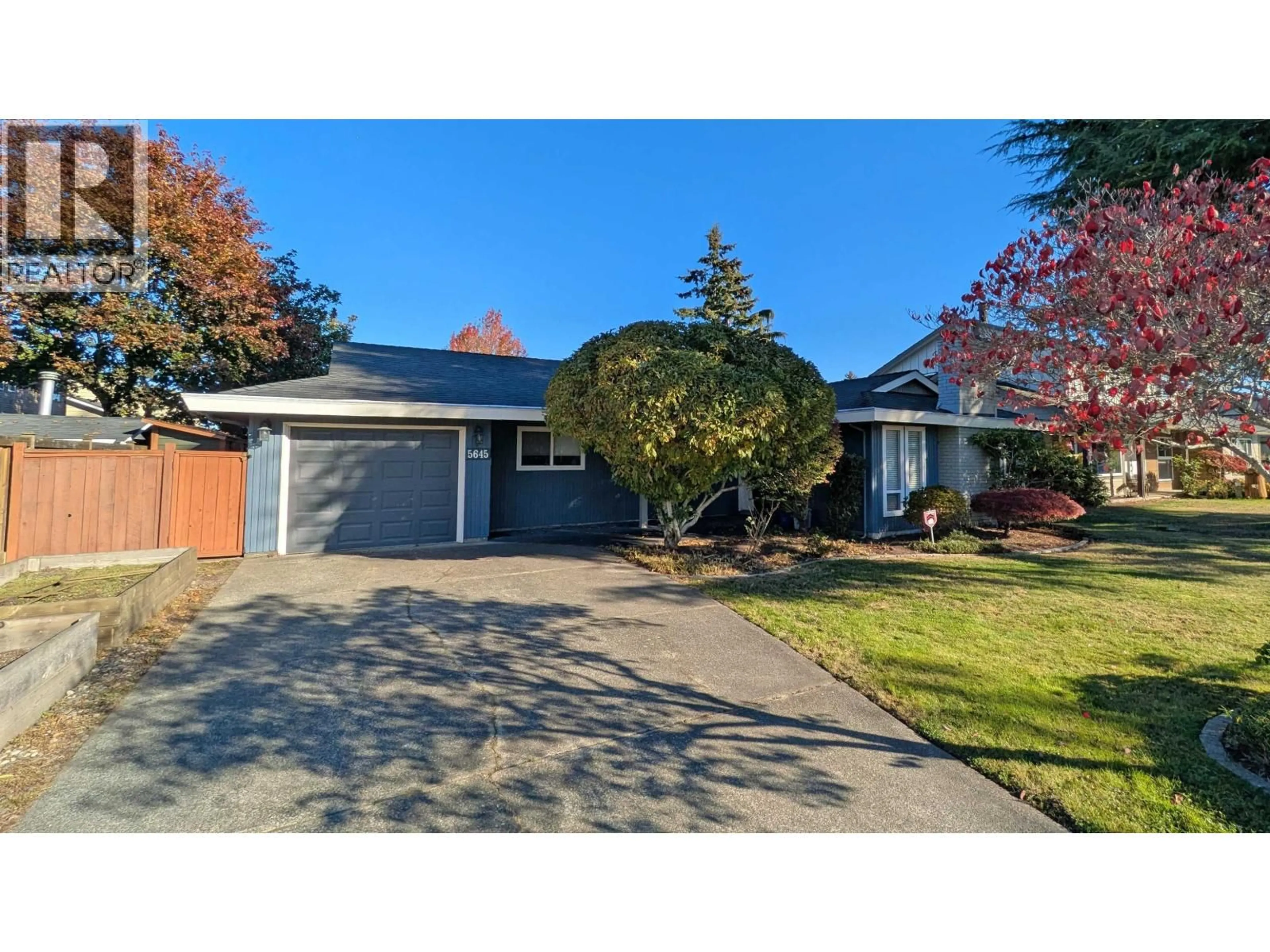A pic from outside/outdoor area/front of a property/back of a property/a pic from drone, street for 5645 51 AVENUE, Delta British Columbia V4K3T6