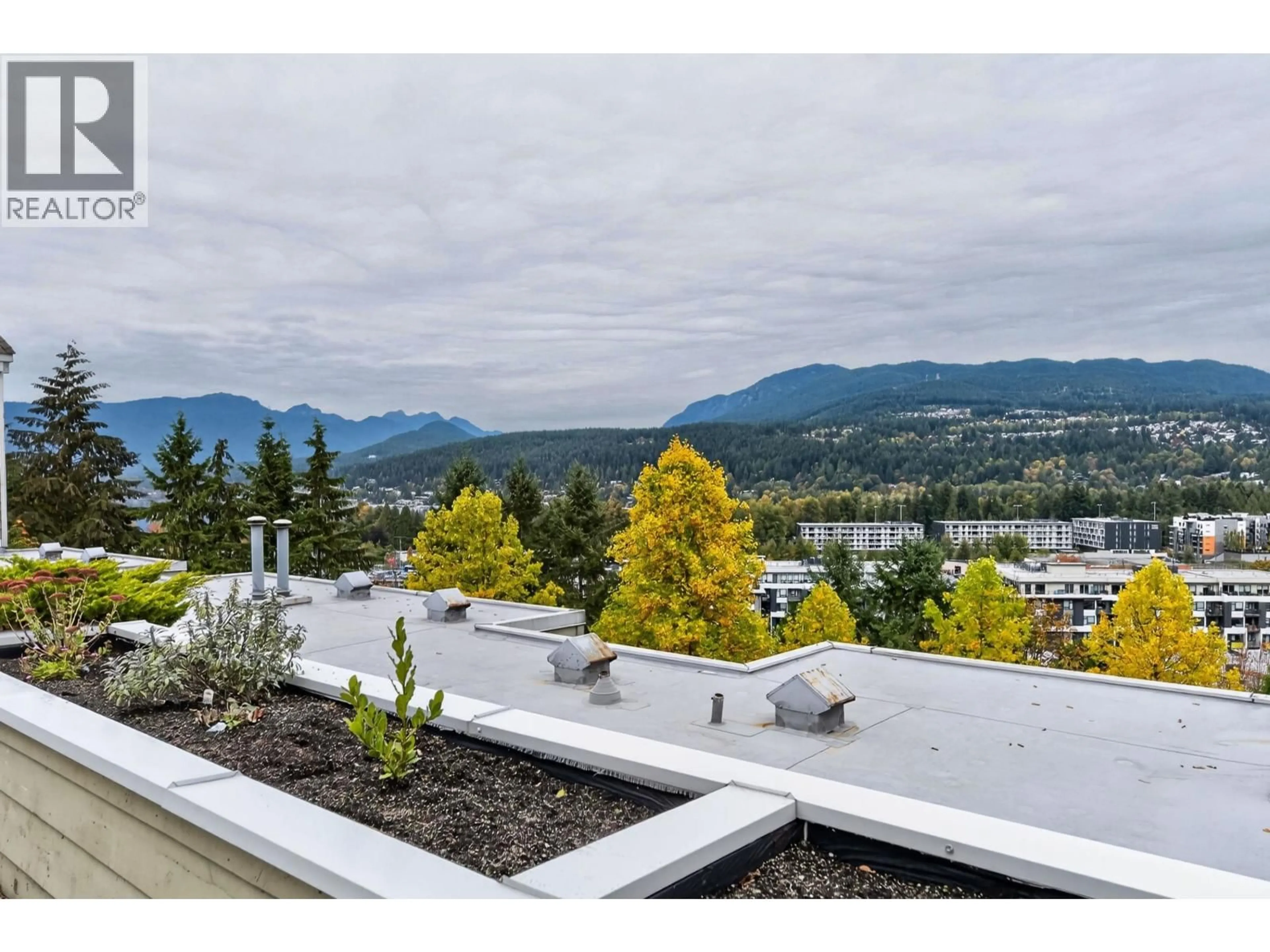 A pic from outside/outdoor area/front of a property/back of a property/a pic from drone, mountain view for 603 - 3001 TERRAVISTA PLACE, Port Moody British Columbia V3H5A2