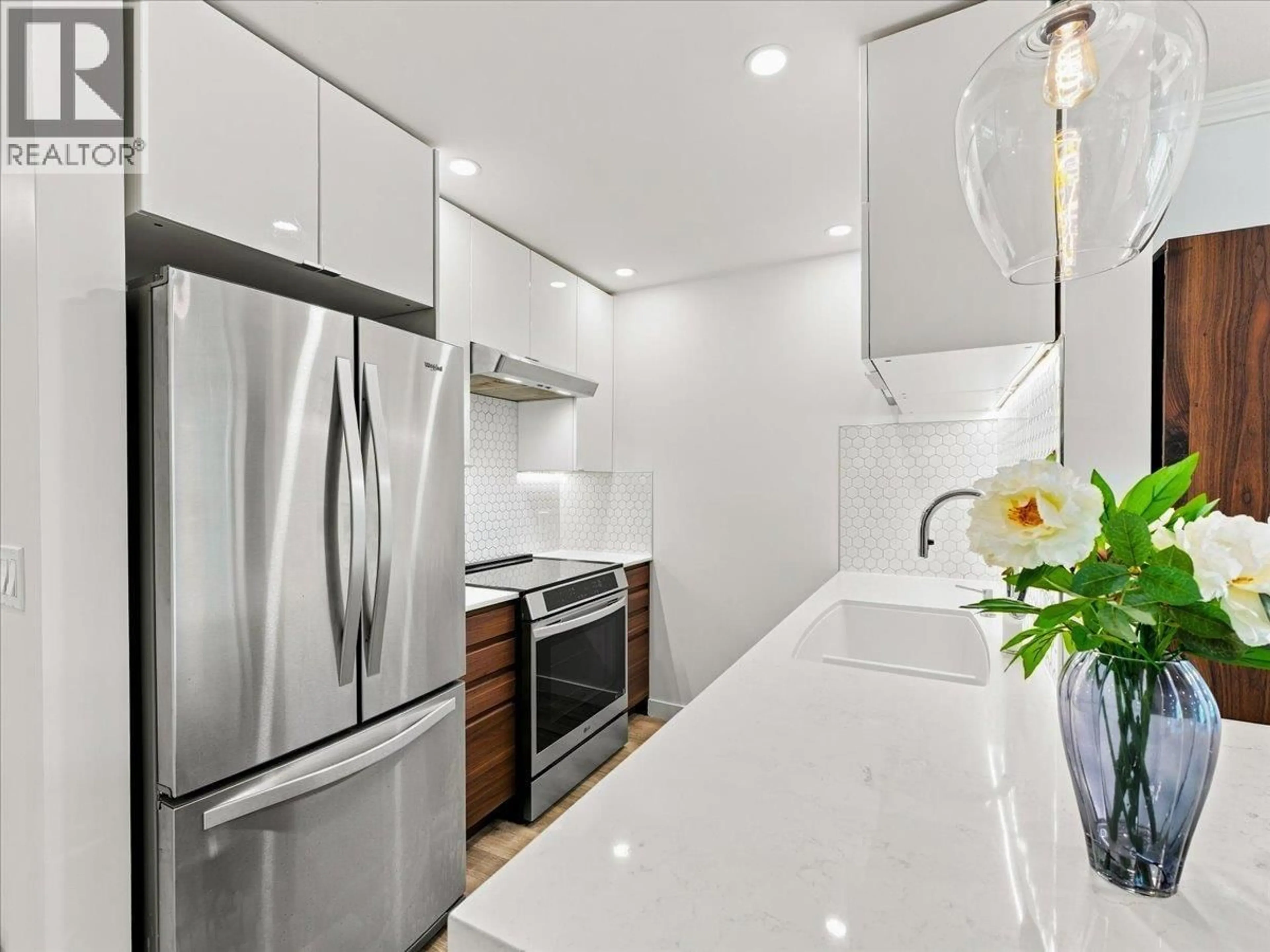 Contemporary kitchen, ceramic/tile floor for 203 - 1729 GEORGIA STREET, Vancouver British Columbia V5L2B3