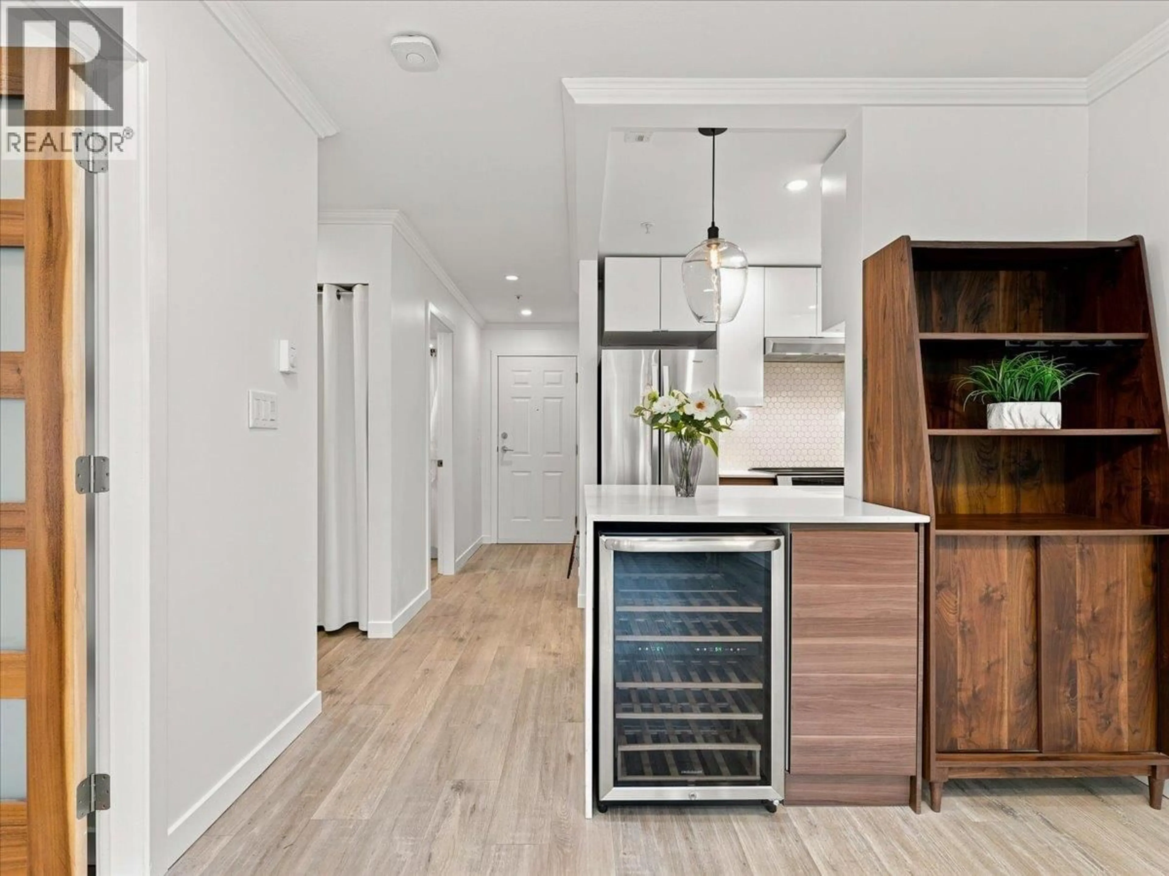 Contemporary kitchen, wood/laminate floor for 203 - 1729 GEORGIA STREET, Vancouver British Columbia V5L2B3