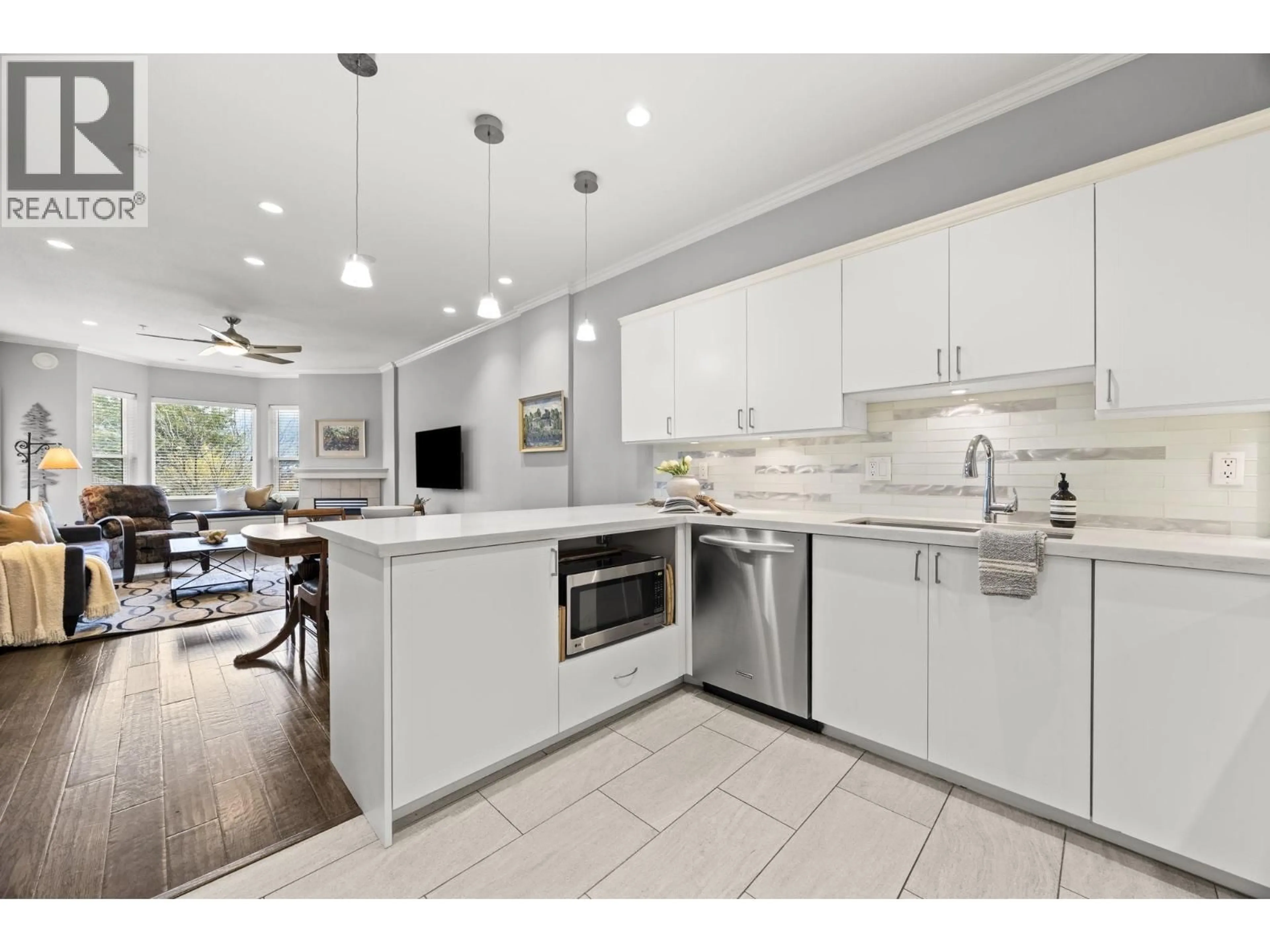 Open concept kitchen, ceramic/tile floor for 103 - 121 SHORELINE CIRCLE, Port Moody British Columbia V3H5G2