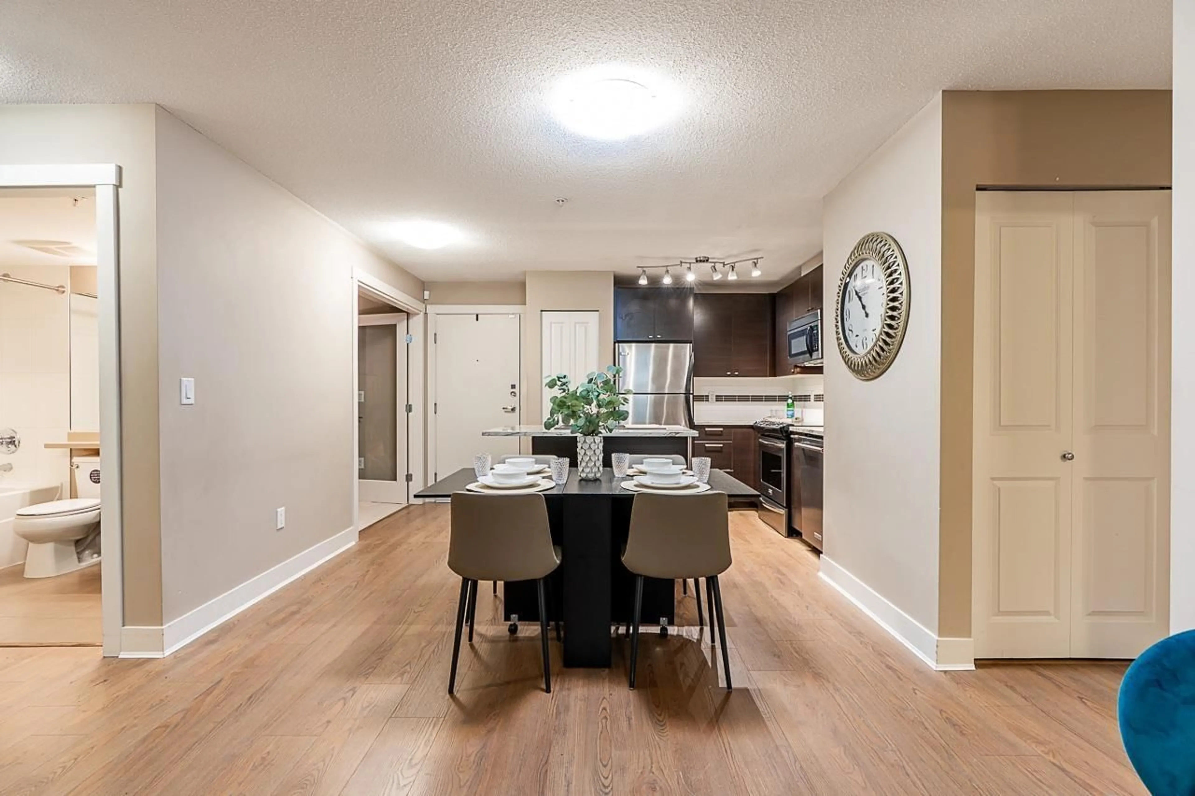 Open concept kitchen, wood/laminate floor for 216 - 6500 194 STREET, Surrey British Columbia V4N5X4