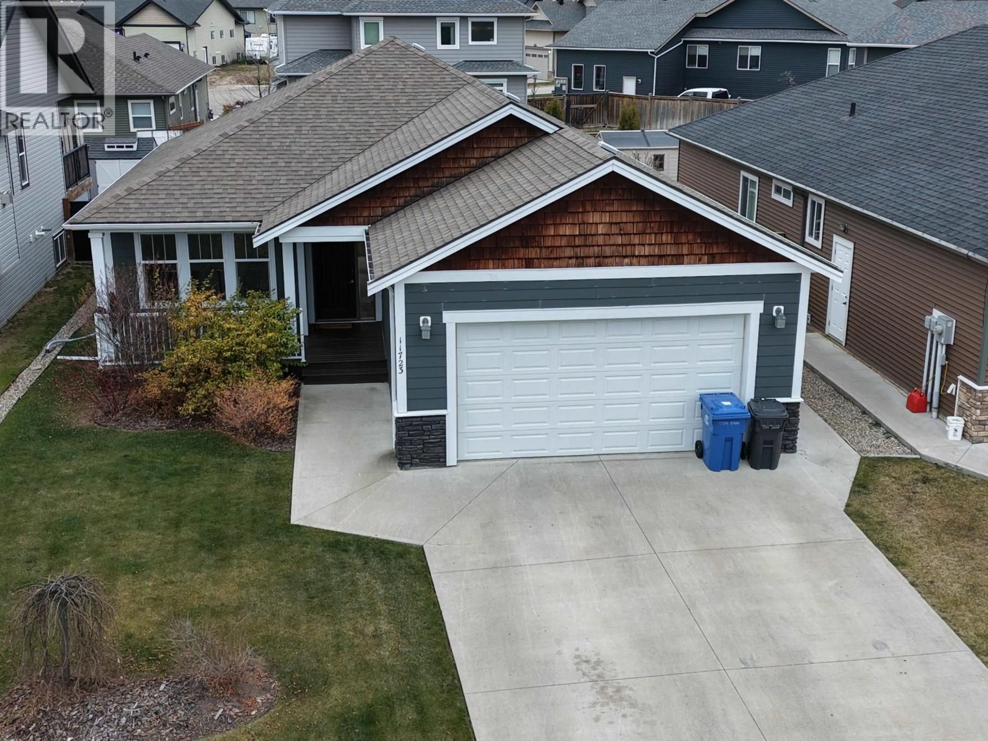 A pic from outside/outdoor area/front of a property/back of a property/a pic from drone, street for 11723 103A STREET, Fort St. John British Columbia V1J0L4