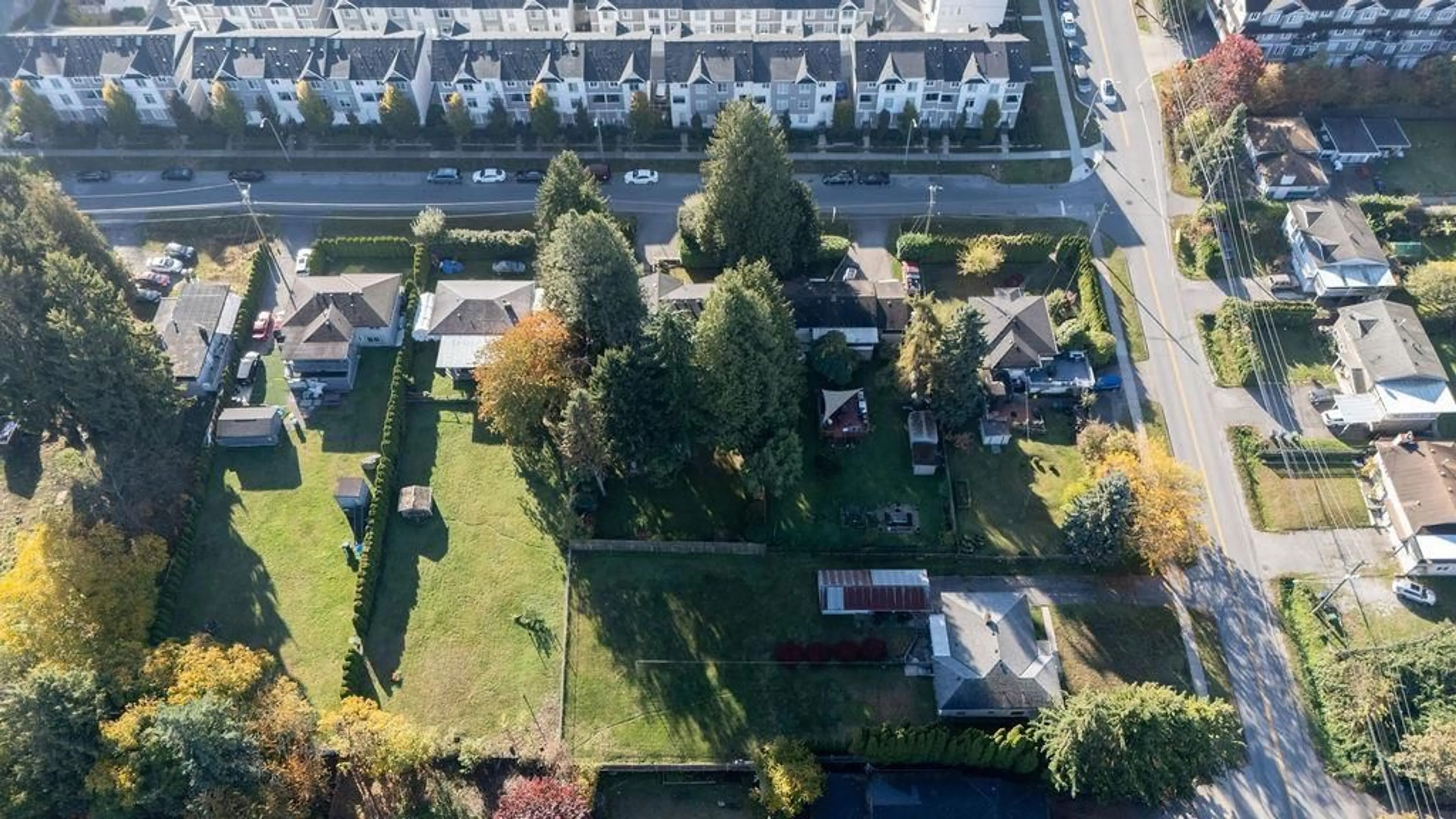 A pic from outside/outdoor area/front of a property/back of a property/a pic from drone, street for 13231 112B AVENUE, Surrey British Columbia V3R2H4