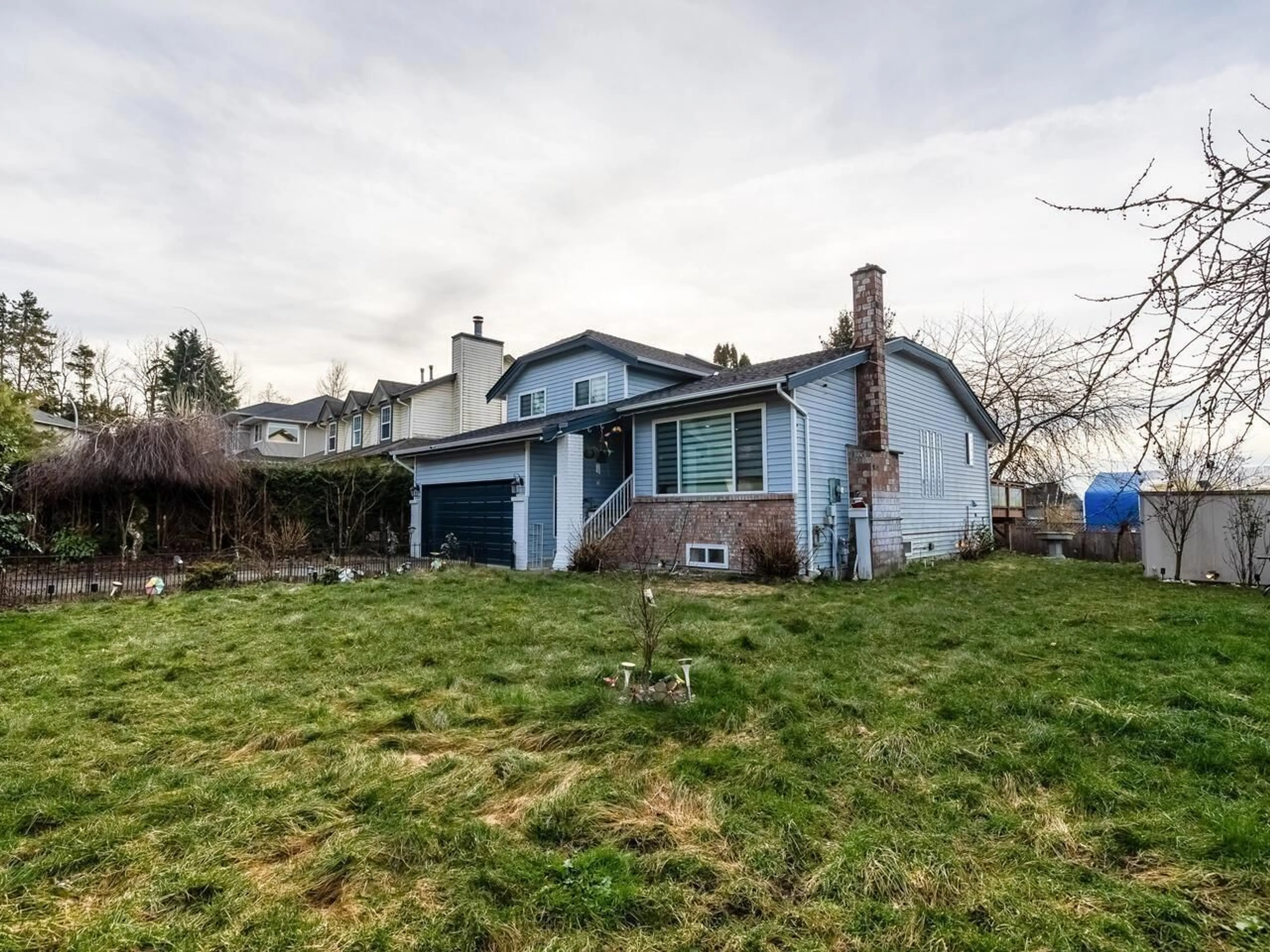 A pic from outside/outdoor area/front of a property/back of a property/a pic from drone, street for 5099 219 STREET, Langley British Columbia V3A8P7