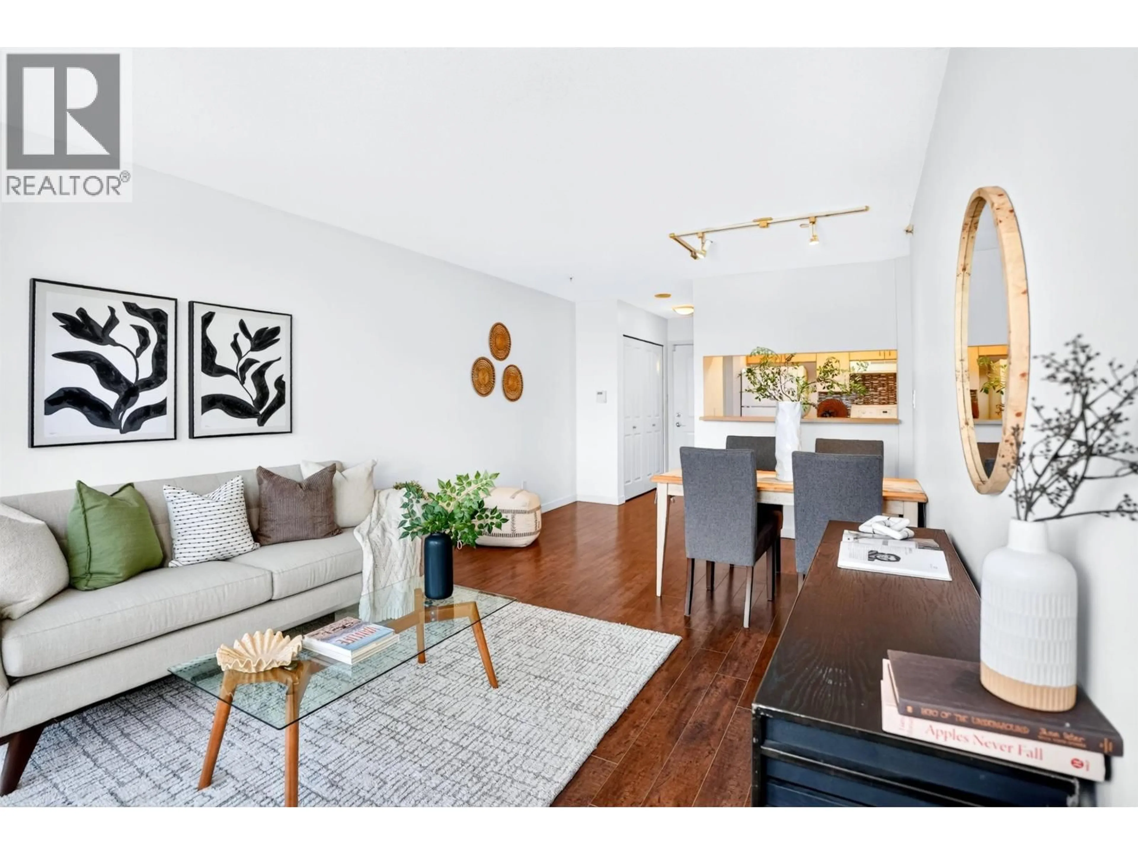 Living room with furniture, wood/laminate floor for 1001 - 3588 CROWLEY DRIVE, Vancouver British Columbia V5R6H3