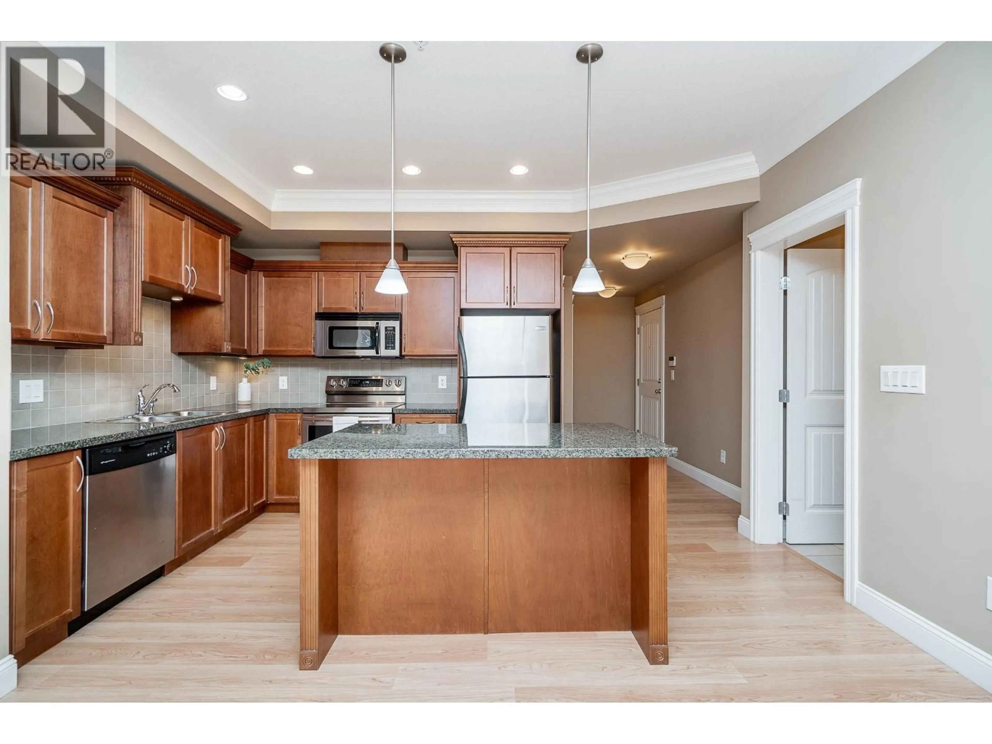 Open concept kitchen, unknown for 301 - 22150 DEWDNEY TRUNK ROAD, Maple Ridge British Columbia V2X3H6