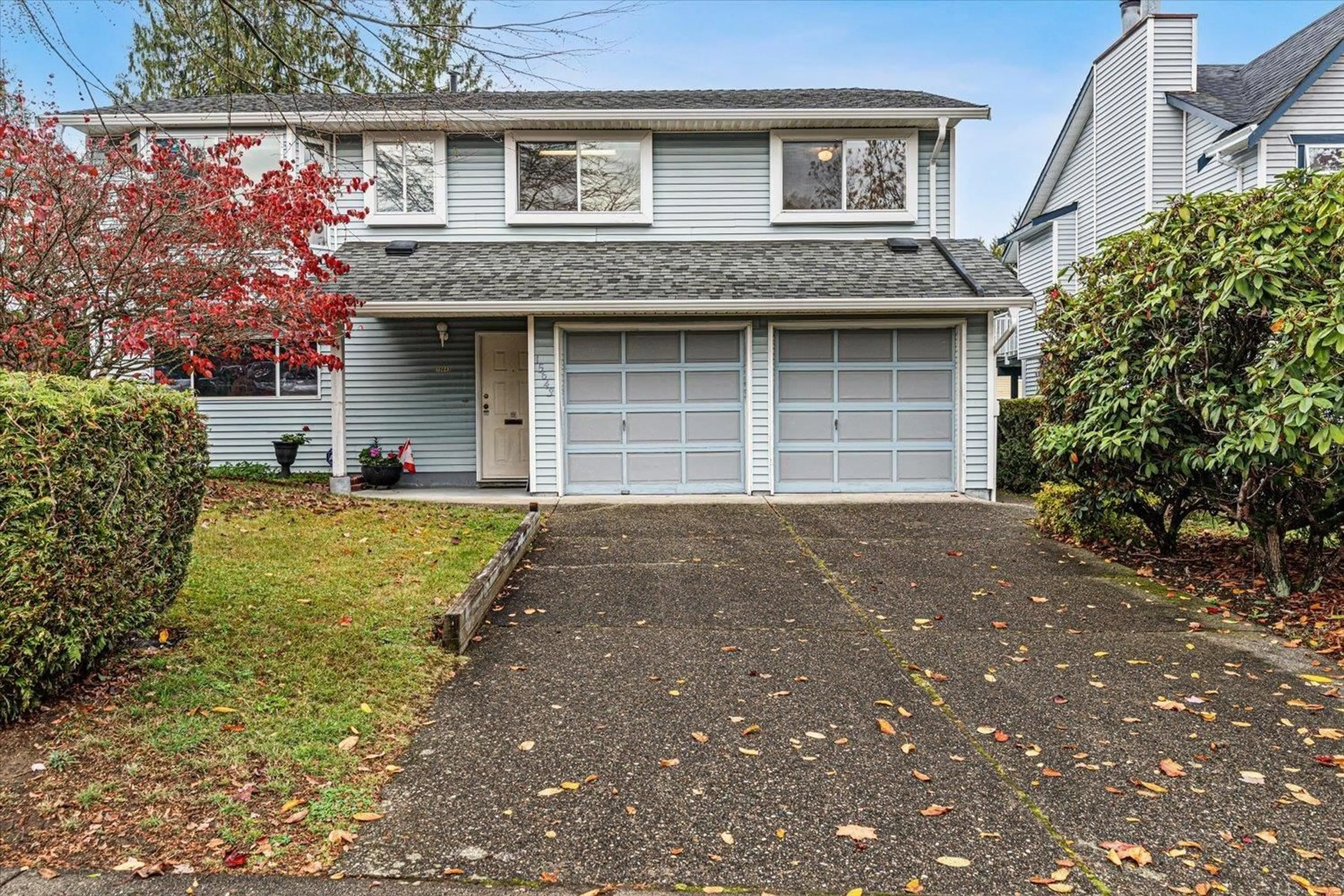 Home with vinyl exterior material, street for 15643 98 AVENUE, Surrey British Columbia V4N2W9