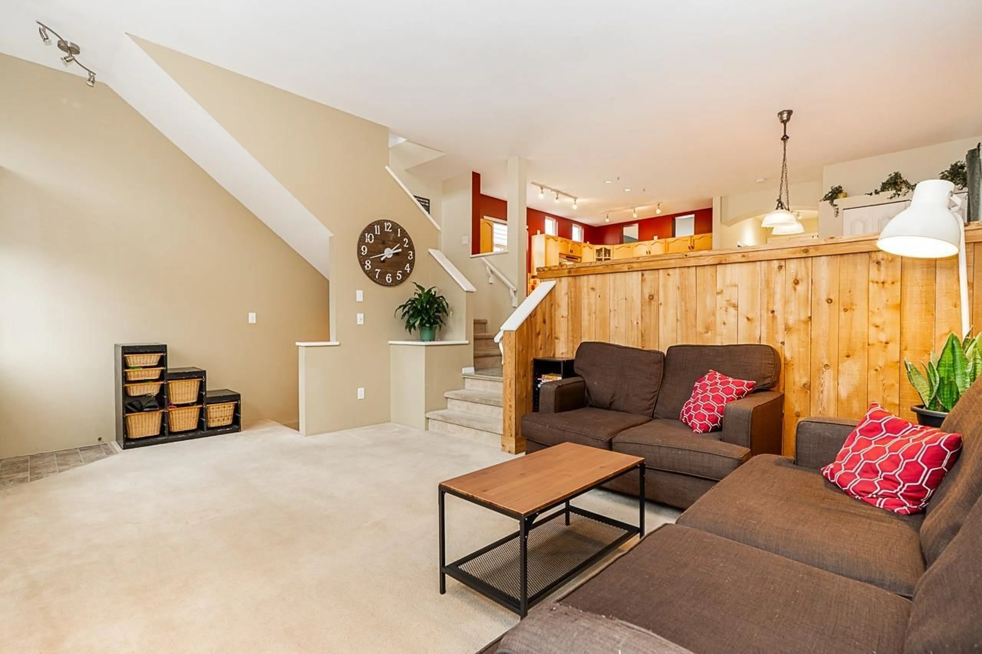 Living room with furniture, wood/laminate floor for 6689 185TH STREET, Surrey British Columbia V3S9B2