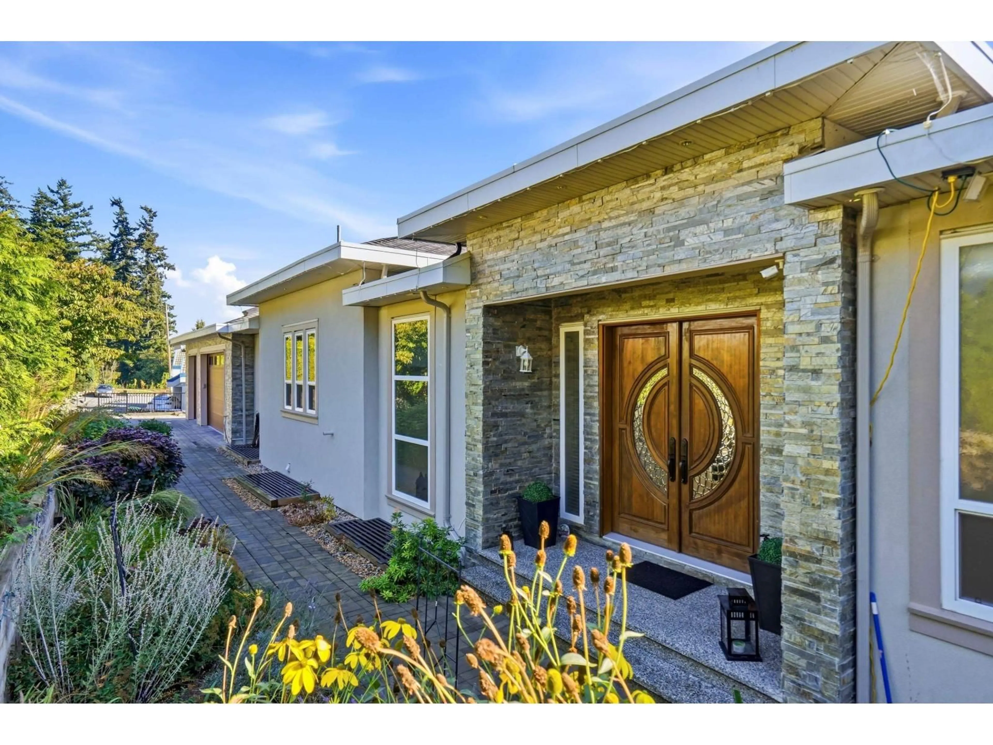 Home with brick exterior material, street for 12528 52A AVENUE, Surrey British Columbia V3X3K3