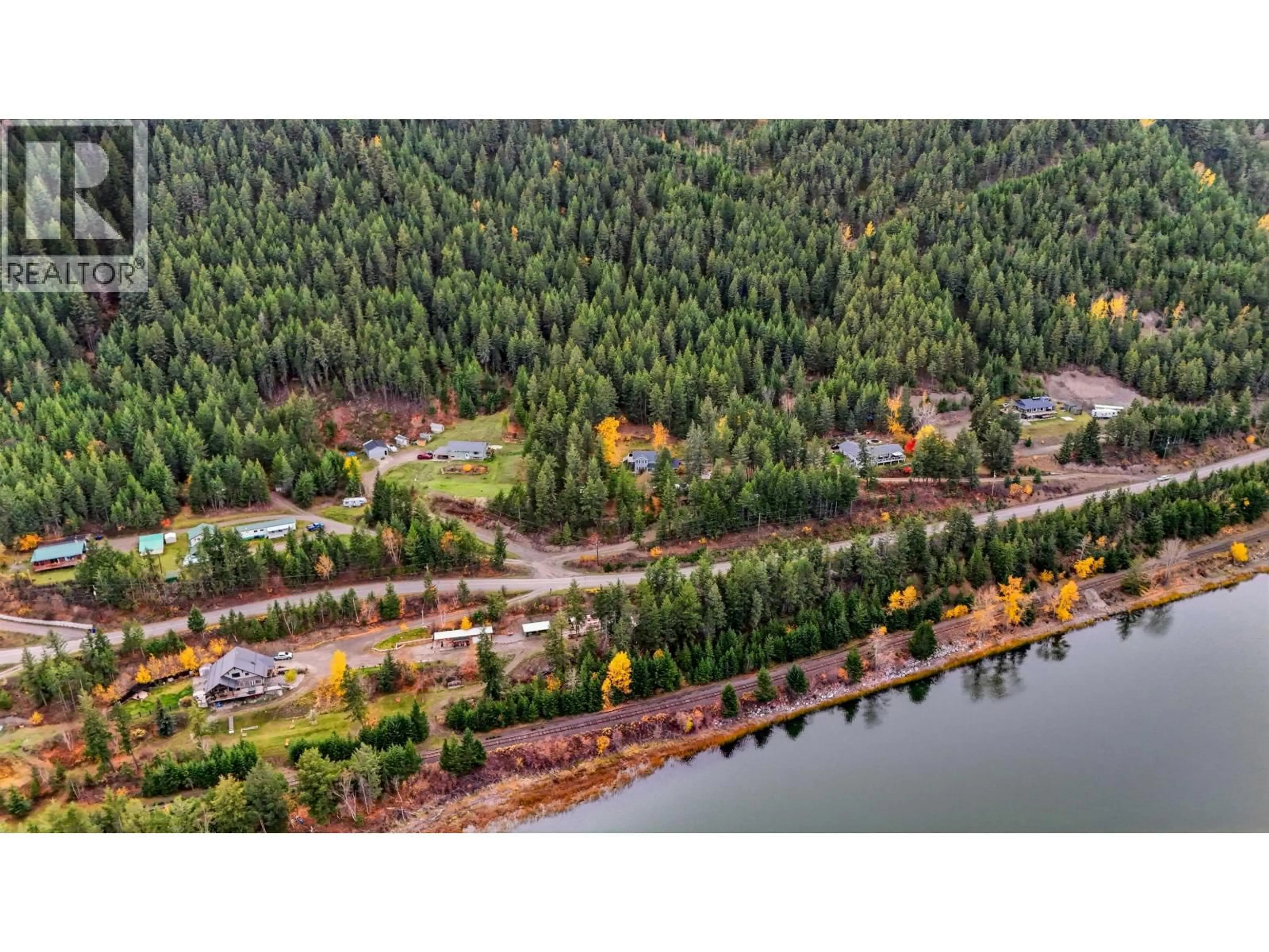 A pic from outside/outdoor area/front of a property/back of a property/a pic from drone, water/lake/river/ocean view for 1931 SOUTH LAKESIDE DRIVE, Williams Lake British Columbia V2G5G1