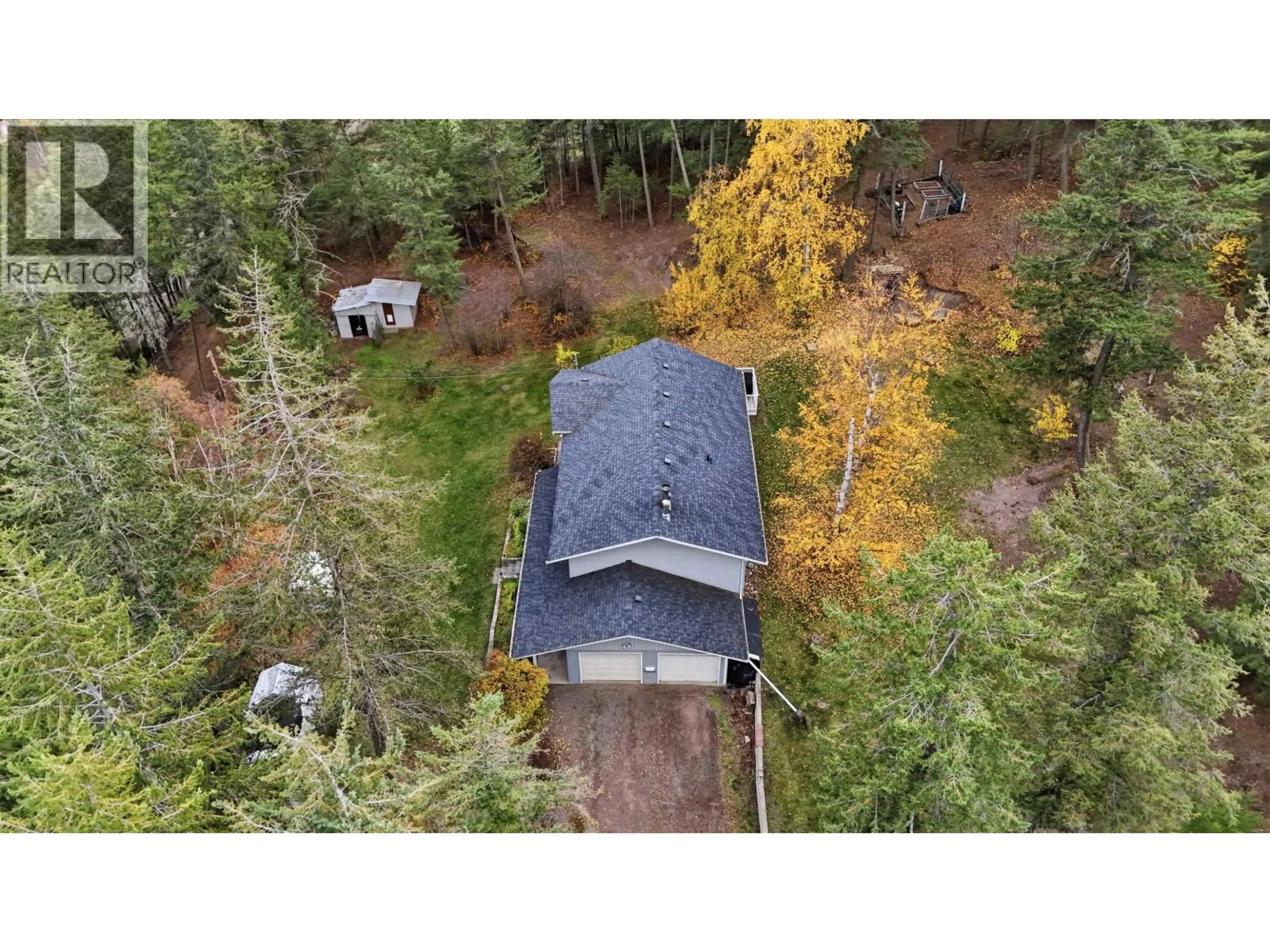 A pic from outside/outdoor area/front of a property/back of a property/a pic from drone, forest/trees view for 1931 SOUTH LAKESIDE DRIVE, Williams Lake British Columbia V2G5G1