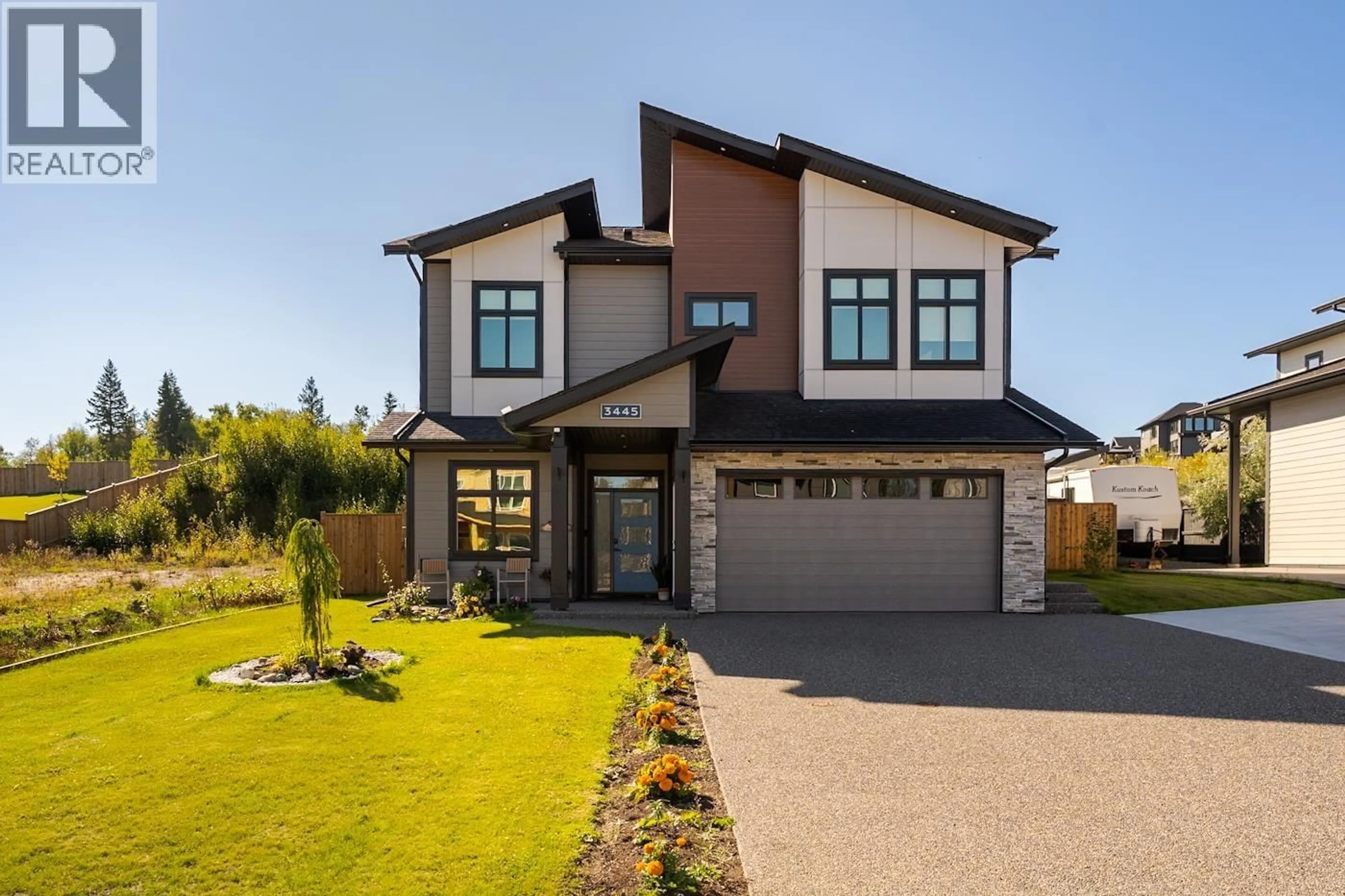 Home with brick exterior material, street for 3445 MUNRO WAY, Prince George British Columbia V2N0K1