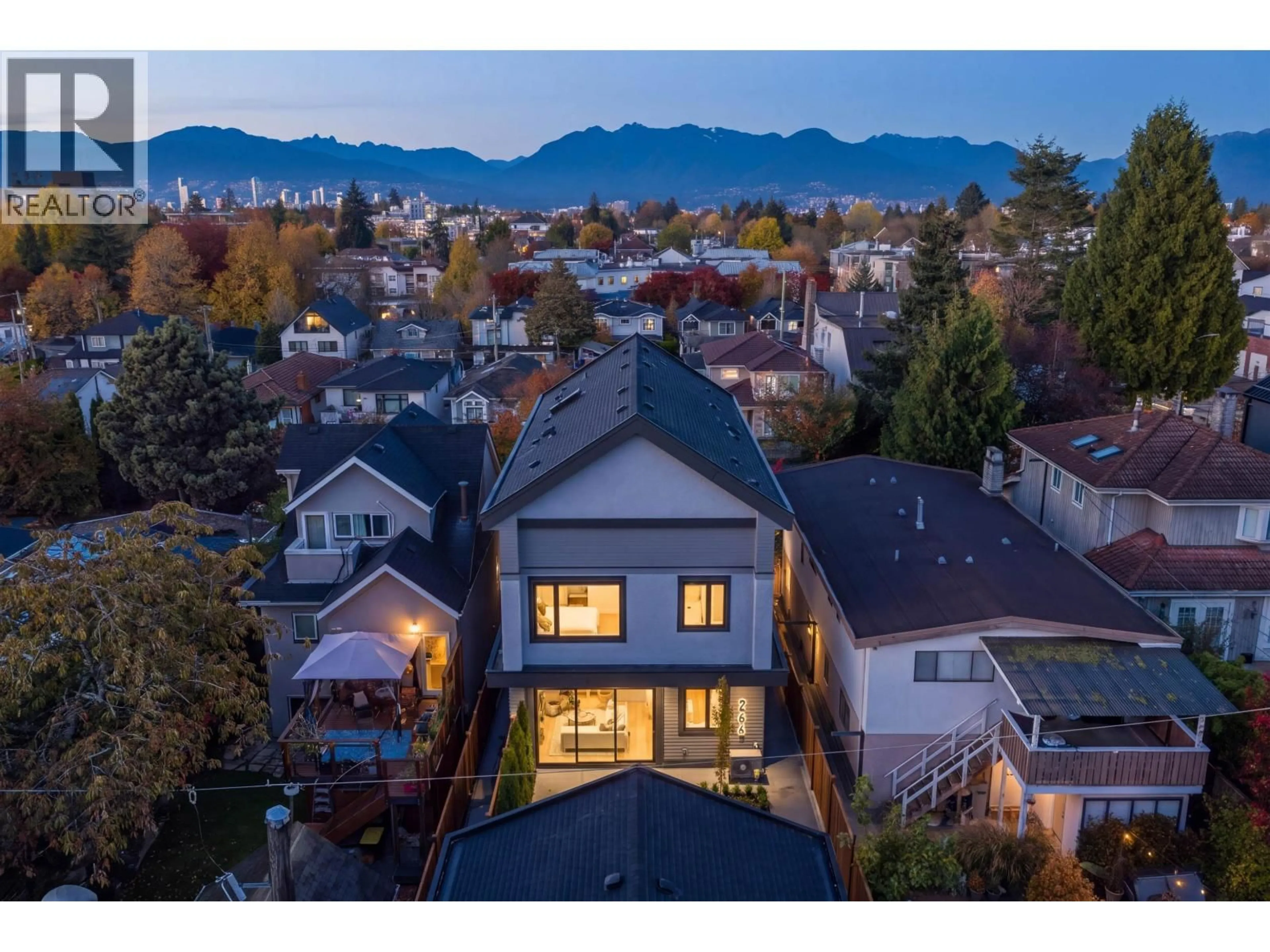 A pic from outside/outdoor area/front of a property/back of a property/a pic from drone, mountain view for 2 - 266 E 38 AVENUE, Vancouver British Columbia V5W1H4