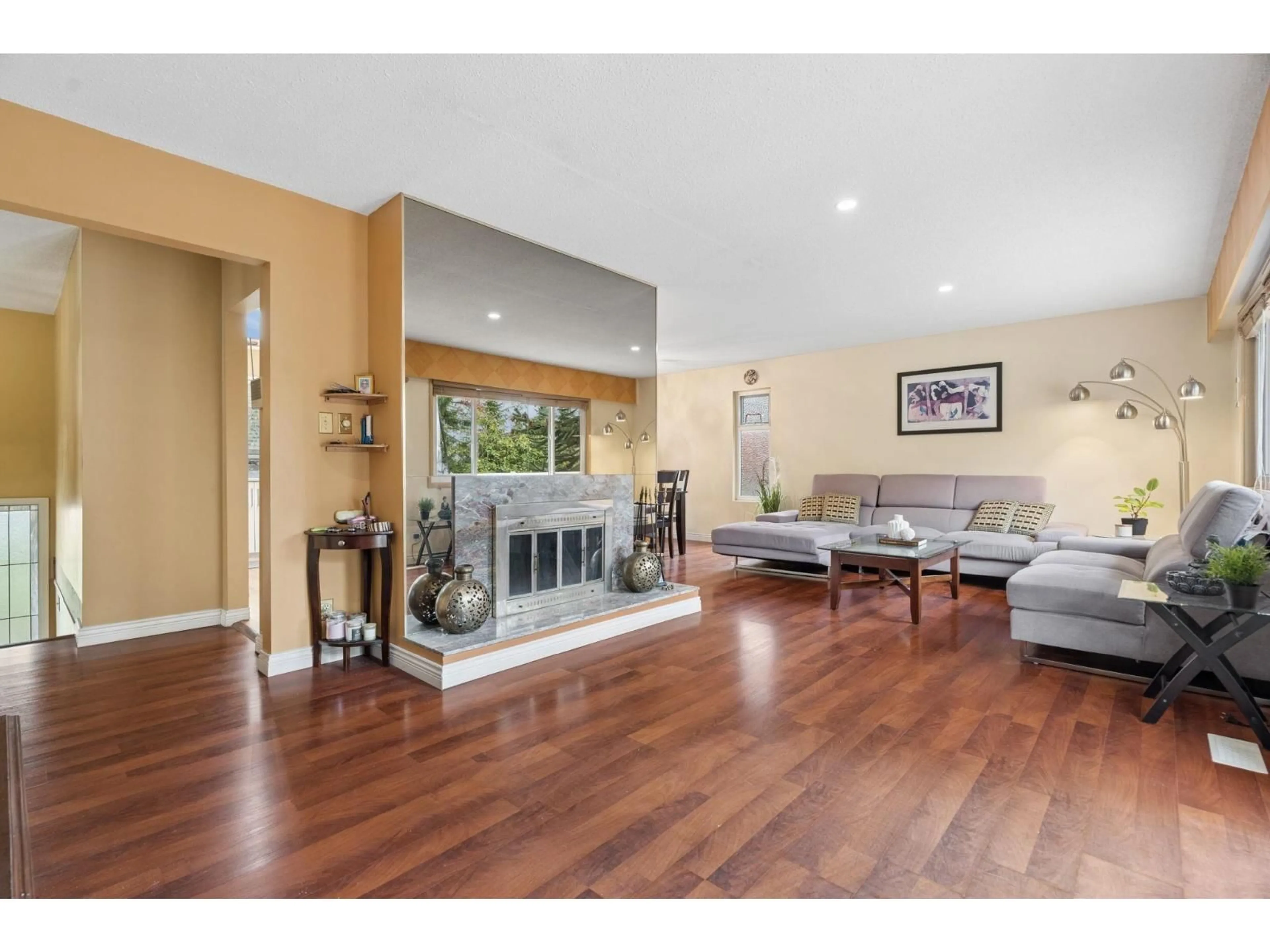 Living room with furniture, wood/laminate floor for 7285 112 STREET, Delta British Columbia V4C4V6