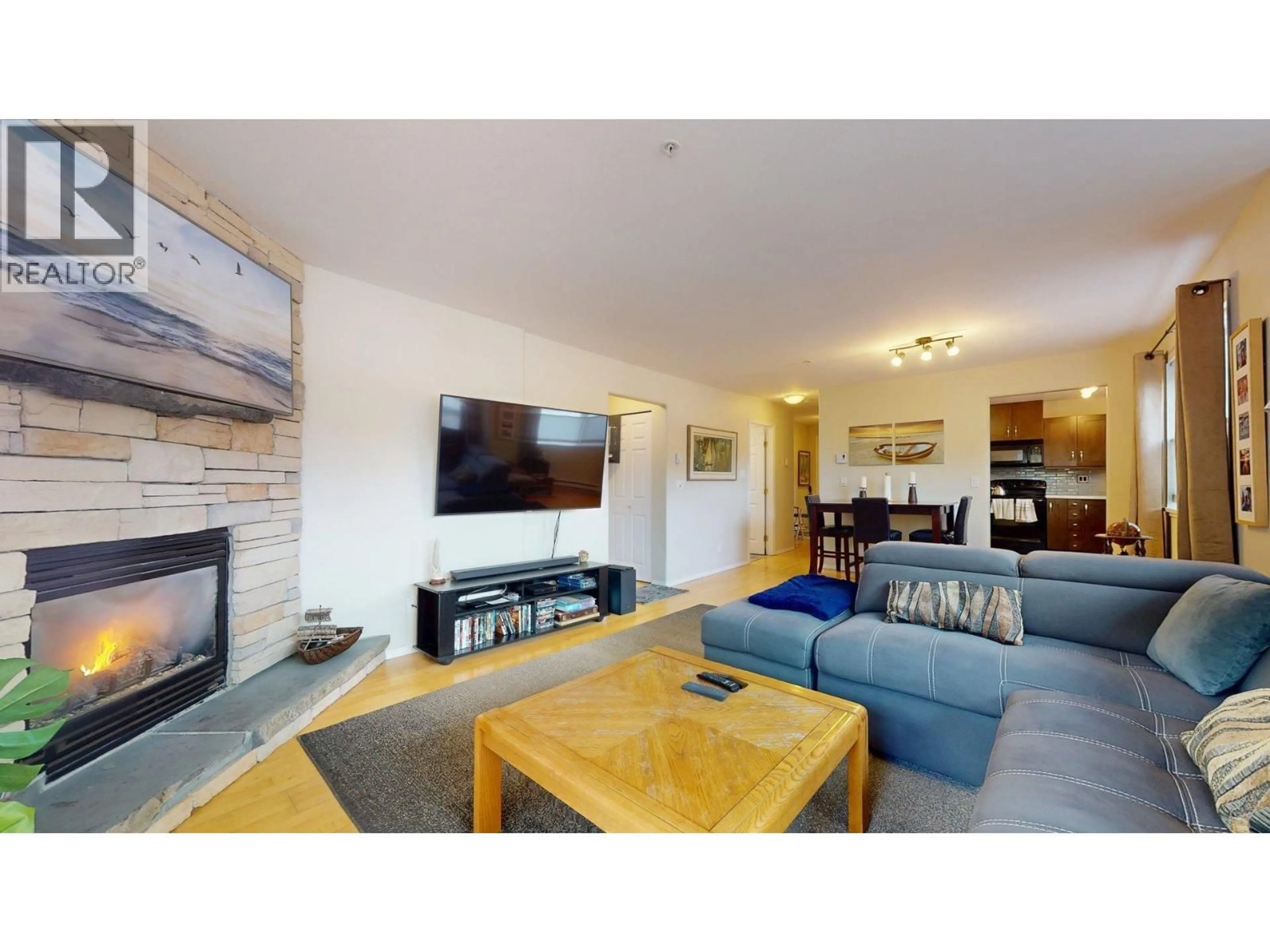 Living room with furniture, unknown for 201 - 1468 PEMBERTON AVENUE, Squamish British Columbia V8B0K2