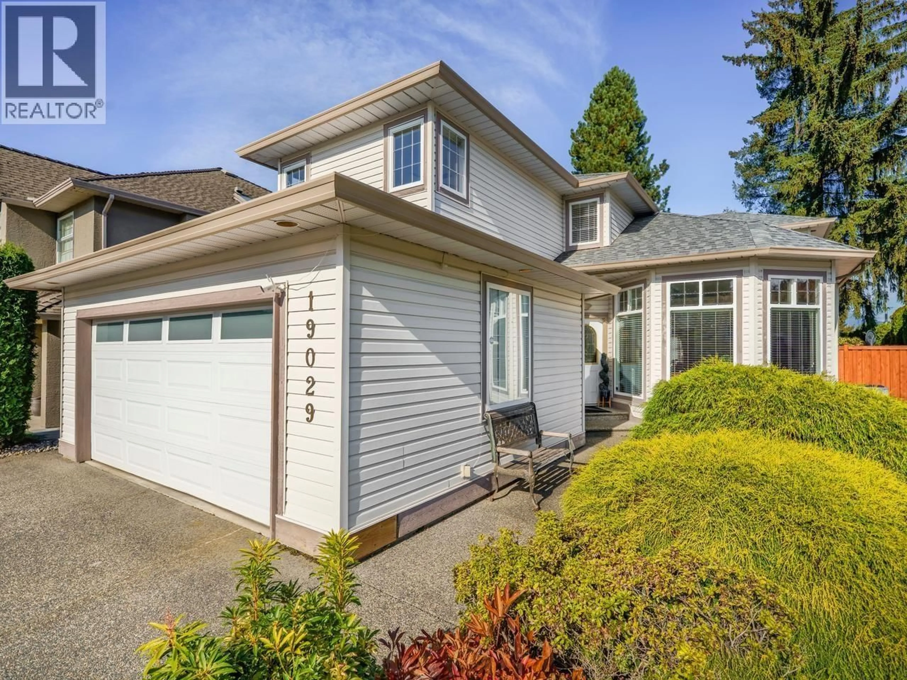 Home with vinyl exterior material, street for 19029 118B AVENUE, Pitt Meadows British Columbia V3Y2L2