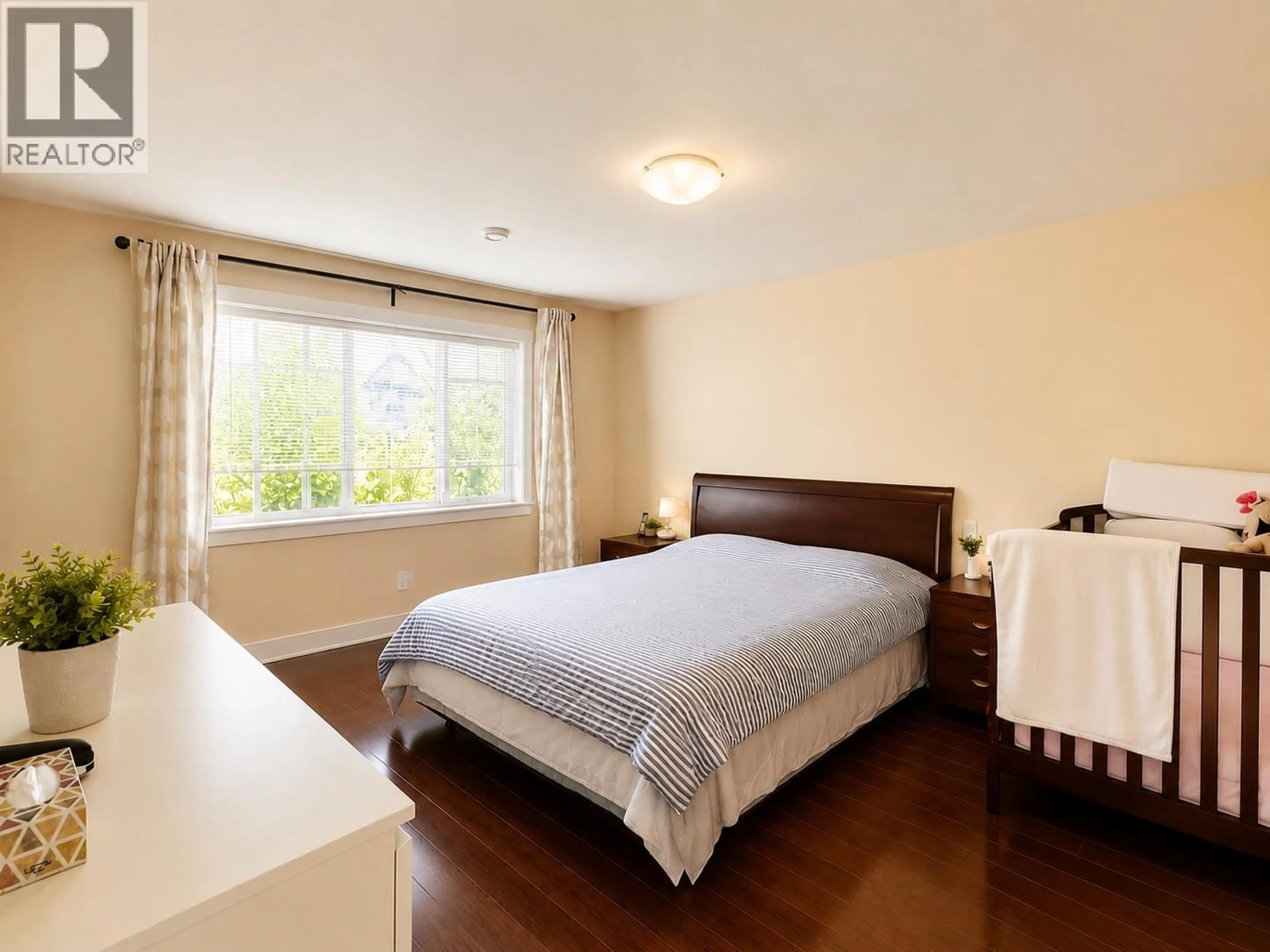 Bedroom with bed, wood/laminate floor for 5 - 9699 SILLS AVENUE, Richmond British Columbia V6Y0C8