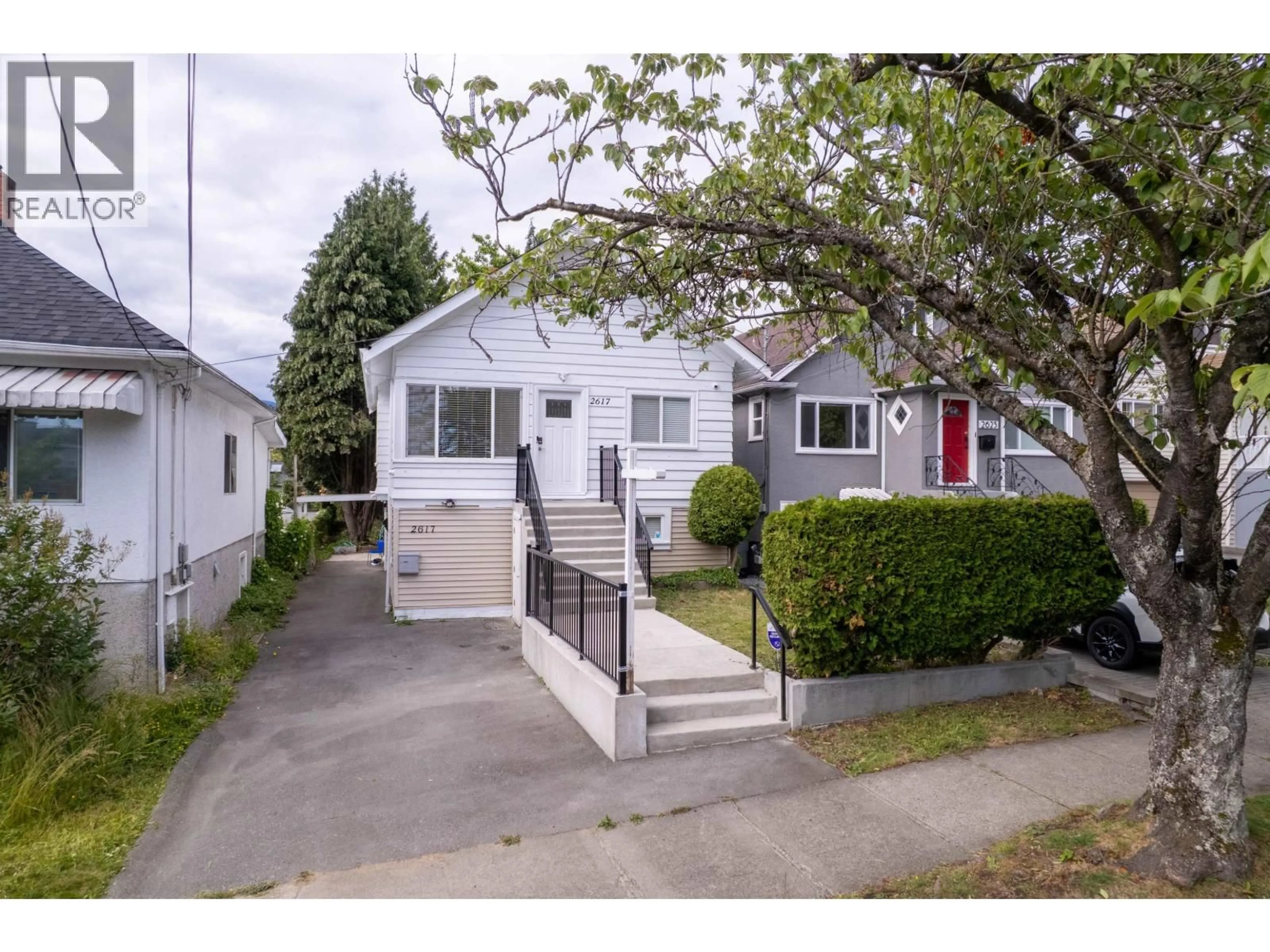 Home with vinyl exterior material, street for 2617 TURNER STREET, Vancouver British Columbia V5K2G1