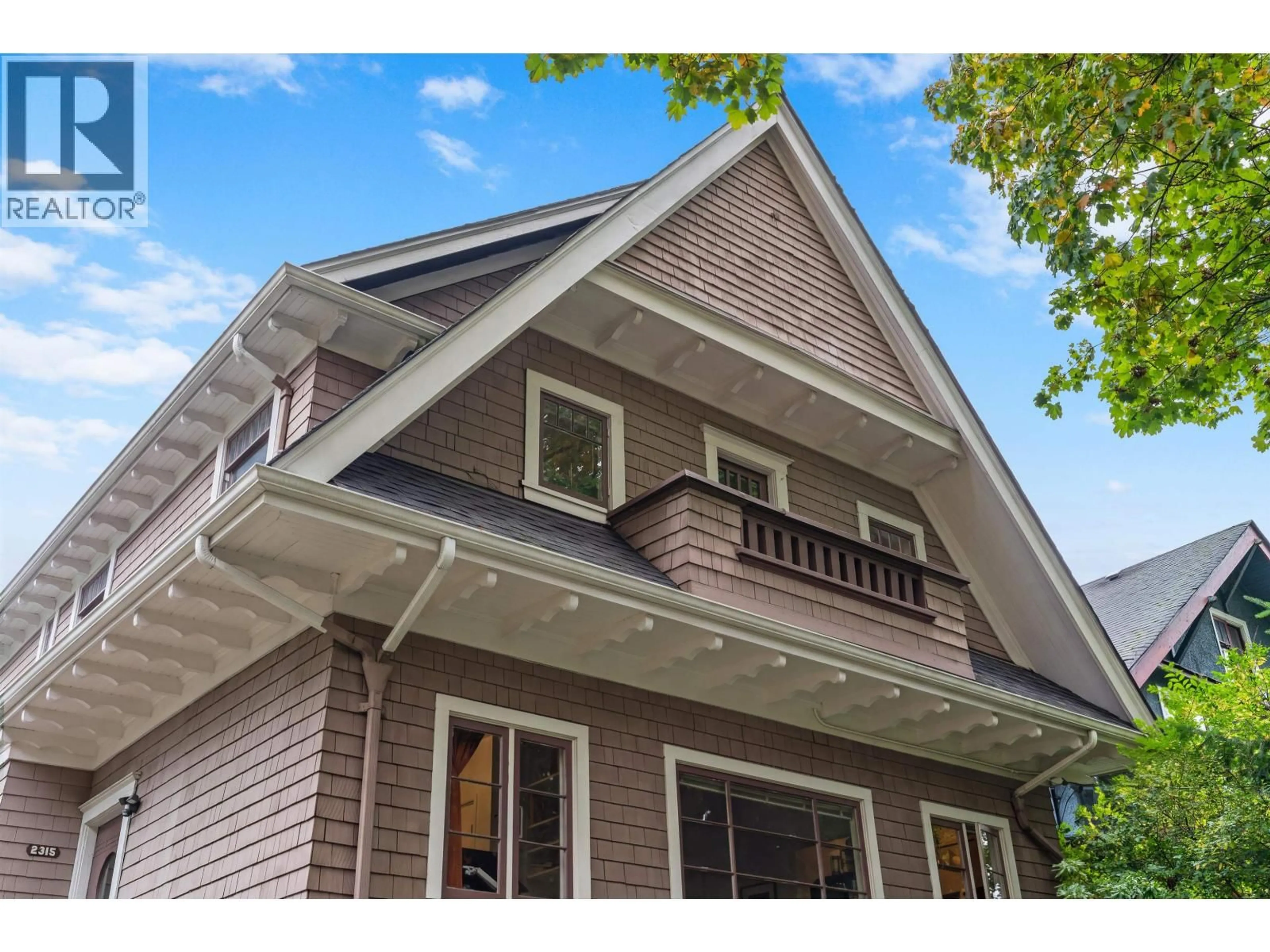 Home with vinyl exterior material, street for 2315 6TH AVENUE, Vancouver British Columbia V6K1W1