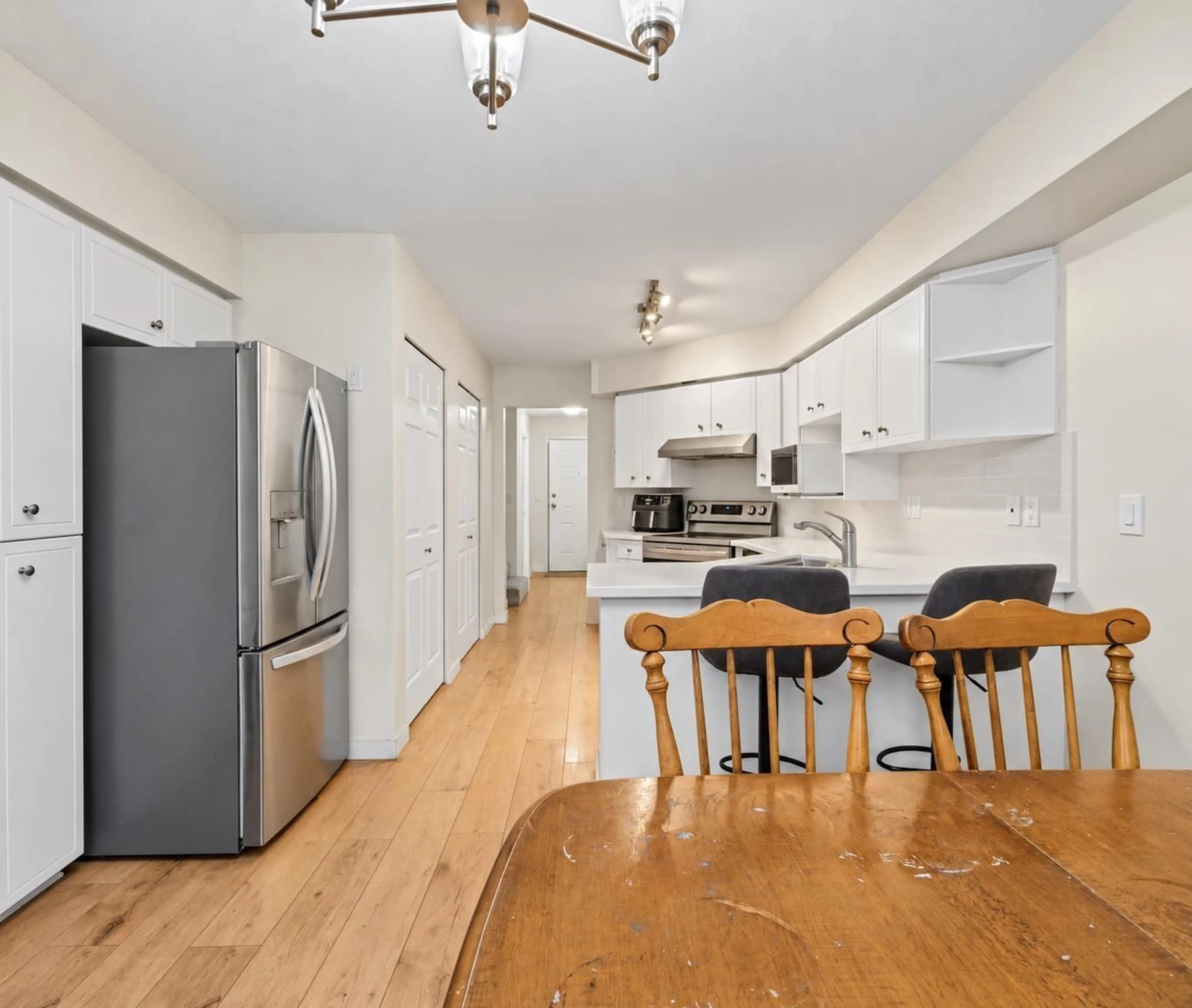 Open concept kitchen, unknown for 18 - 8257 121A STREET, Surrey British Columbia V3W3R4