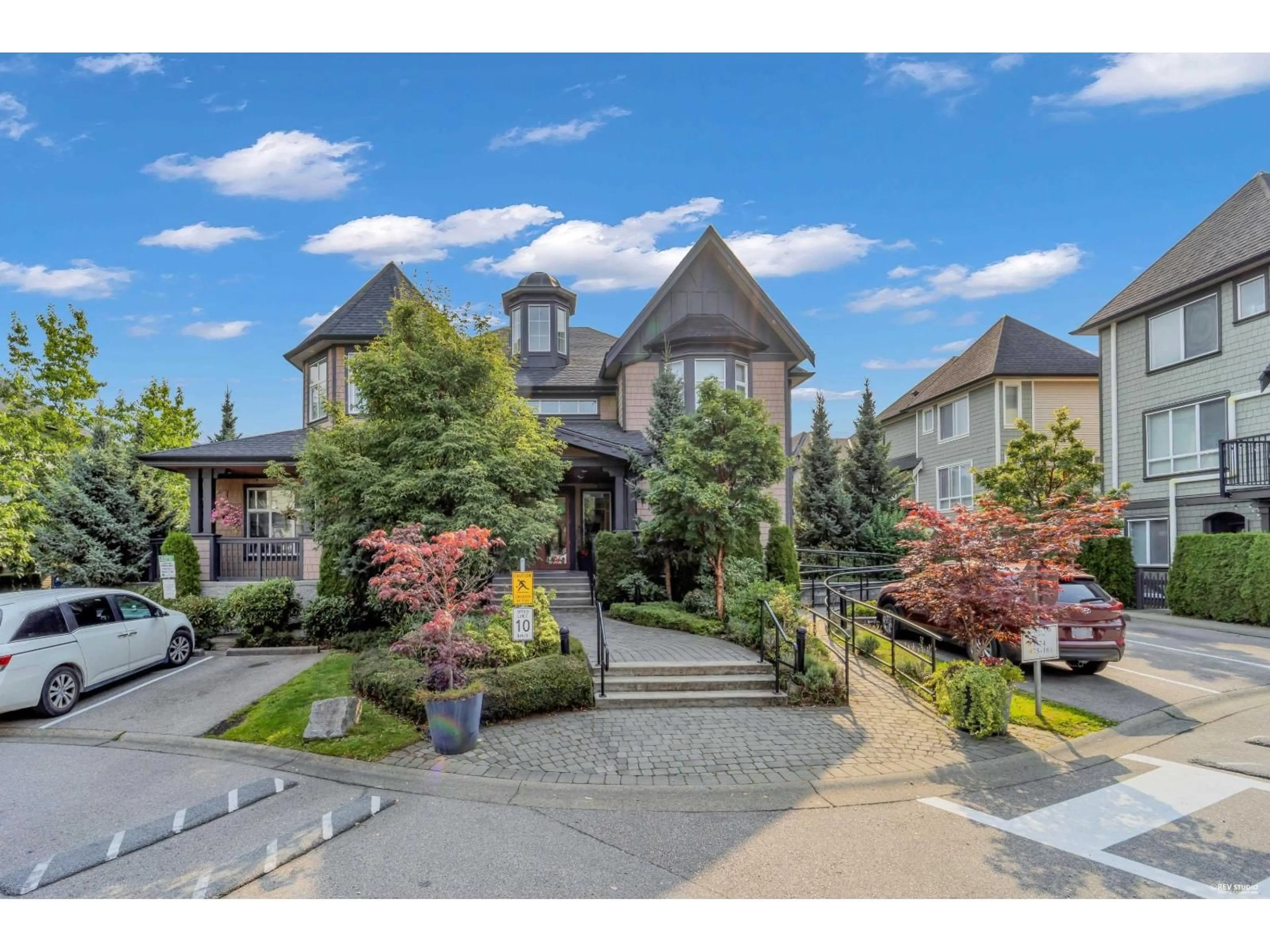 A pic from outside/outdoor area/front of a property/back of a property/a pic from drone, street for 100 - 8138 204 STREET, Langley British Columbia V2Y0T4